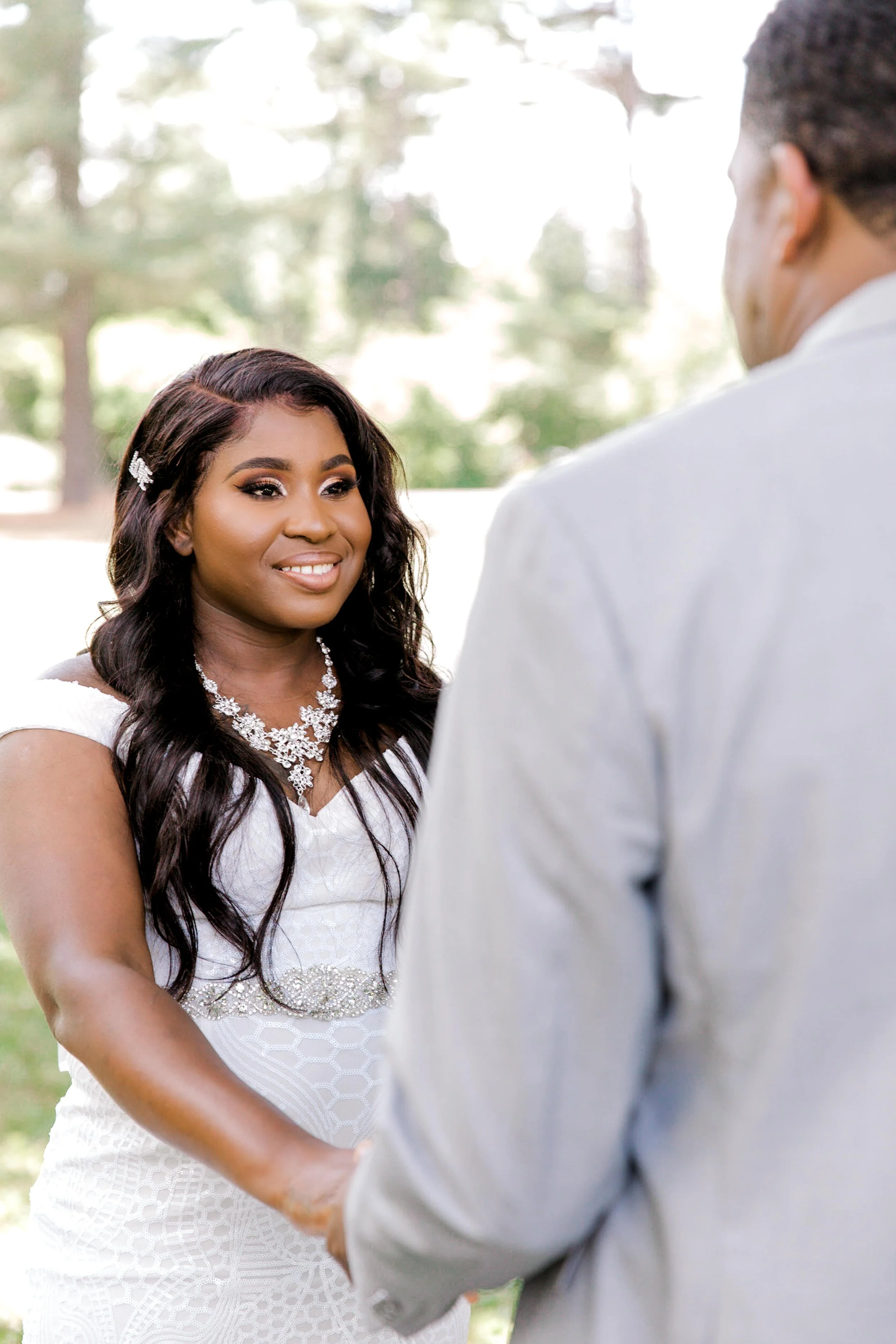 Bride and groom exchanging vows during an outdoor elopement ceremony in Morris County, New Jersey.