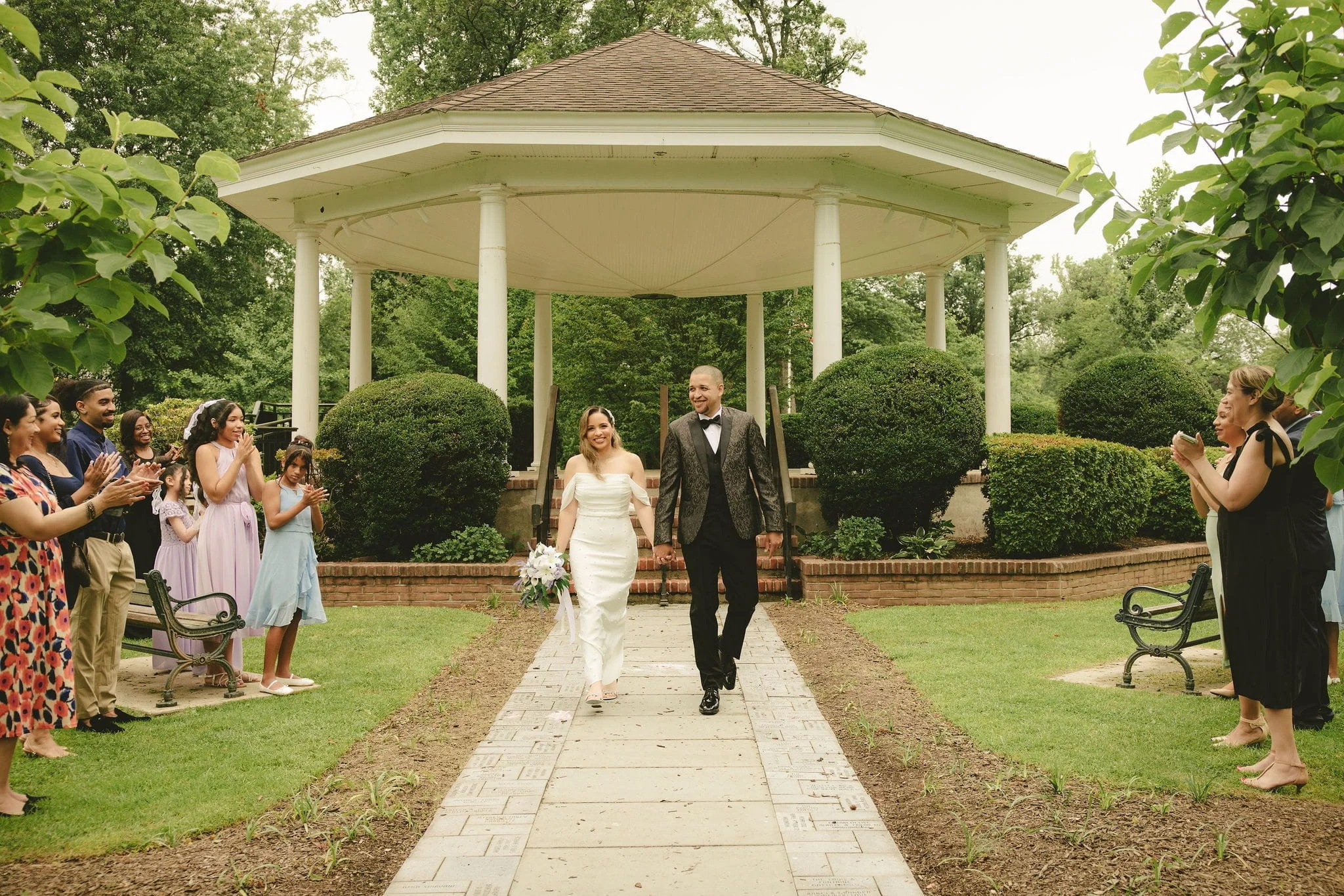 Newlywed couple celebrating with guests after their elopement ceremony in Westfield, New Jersey