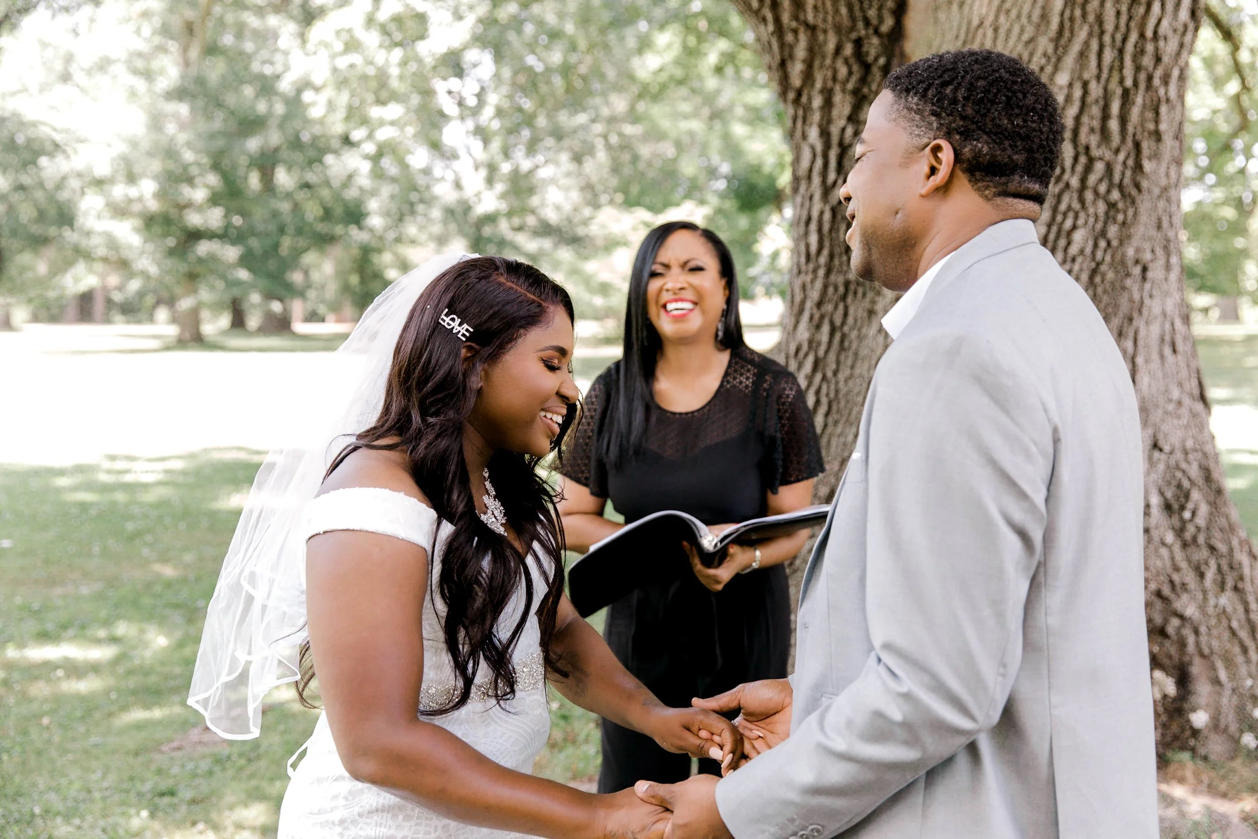 Couple sharing a joyful moment during an outdoor elopement ceremony in Morris County, New Jersey.