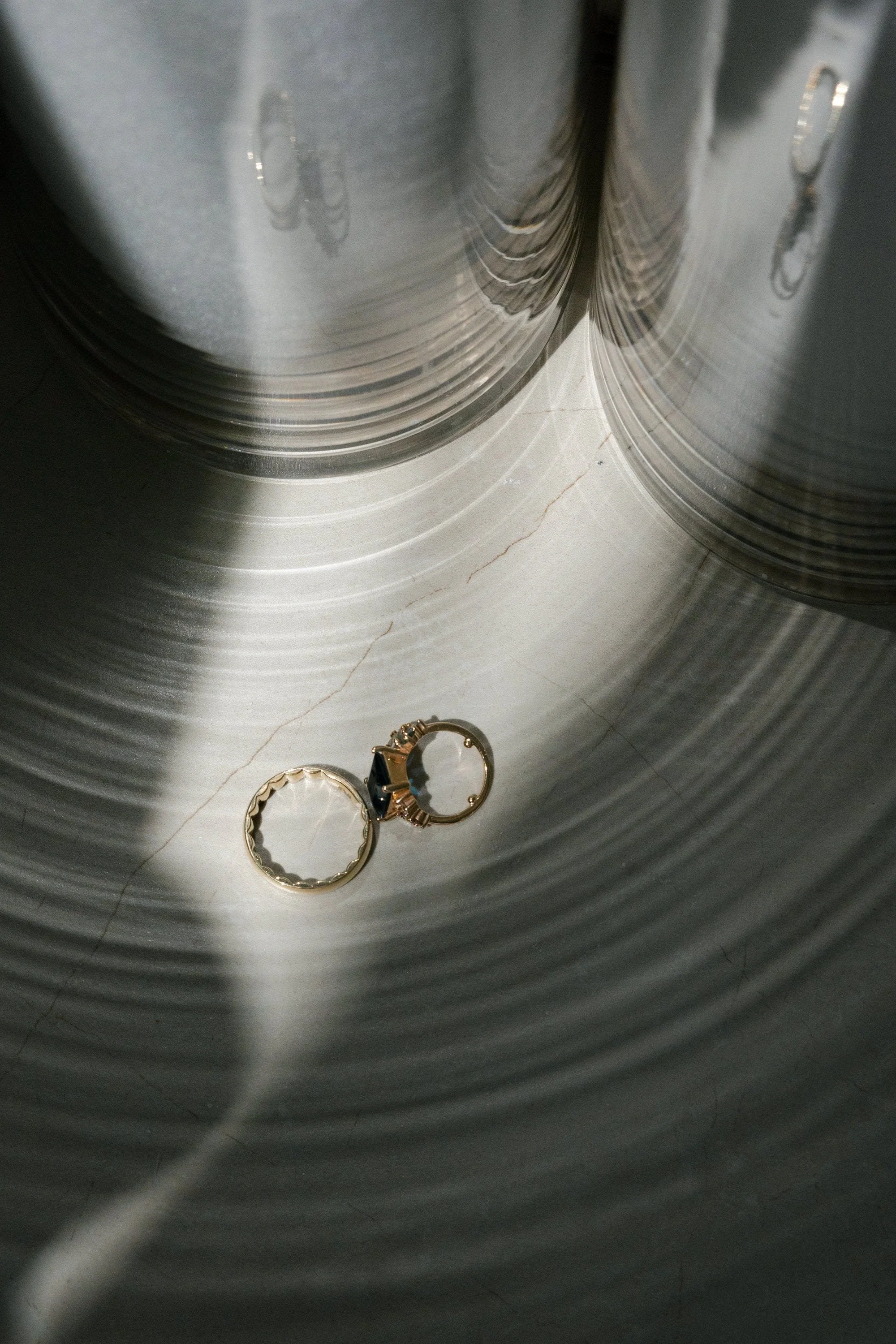Caroline and Brett’s wedding rings photographed together before their Florentine Gardens ceremony