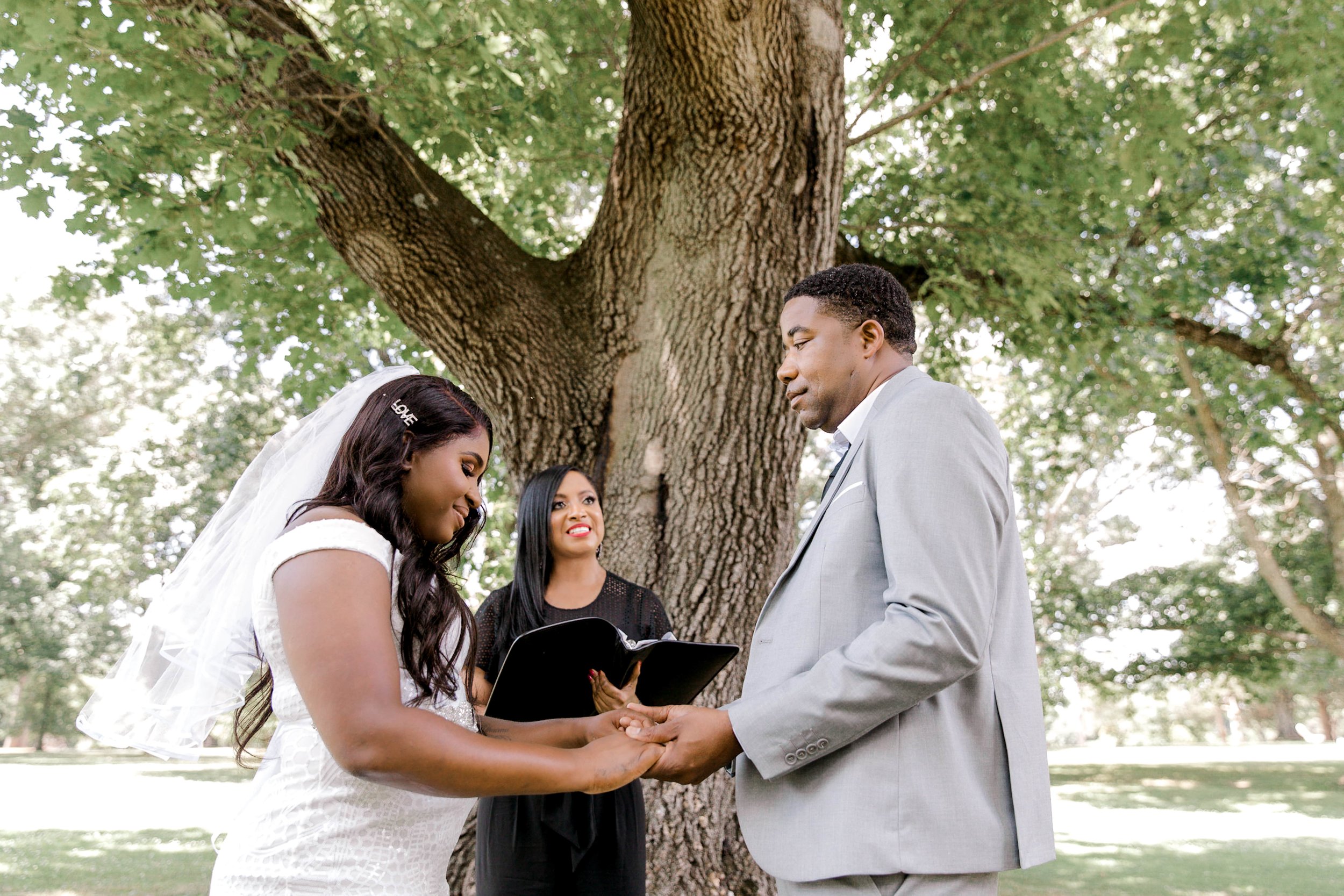 Elopement ceremony in Morris County with officiant guiding the couple