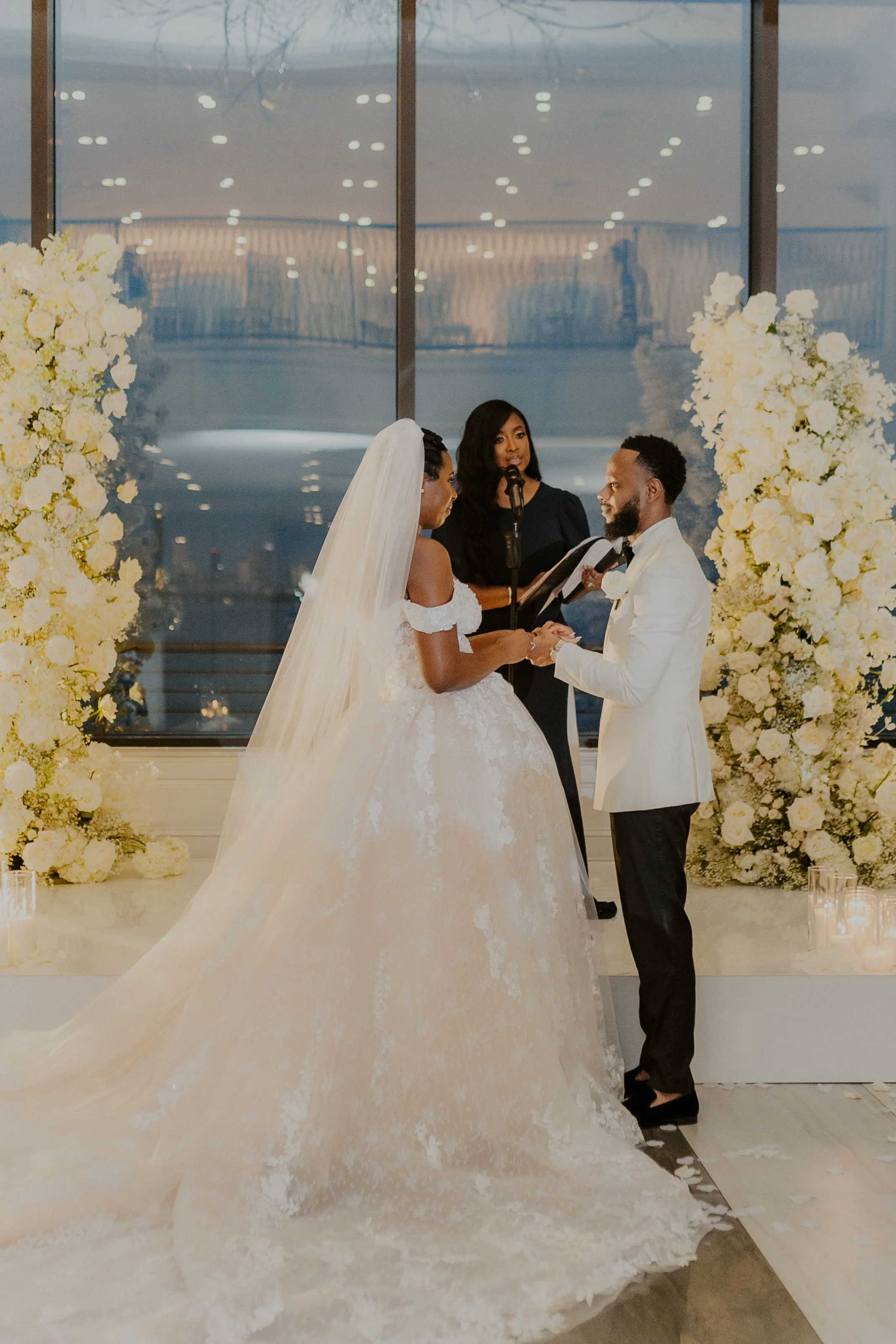 Wedding officiant guiding a couple through their vow exchange at Hudson House in Jersey City, New Jersey
