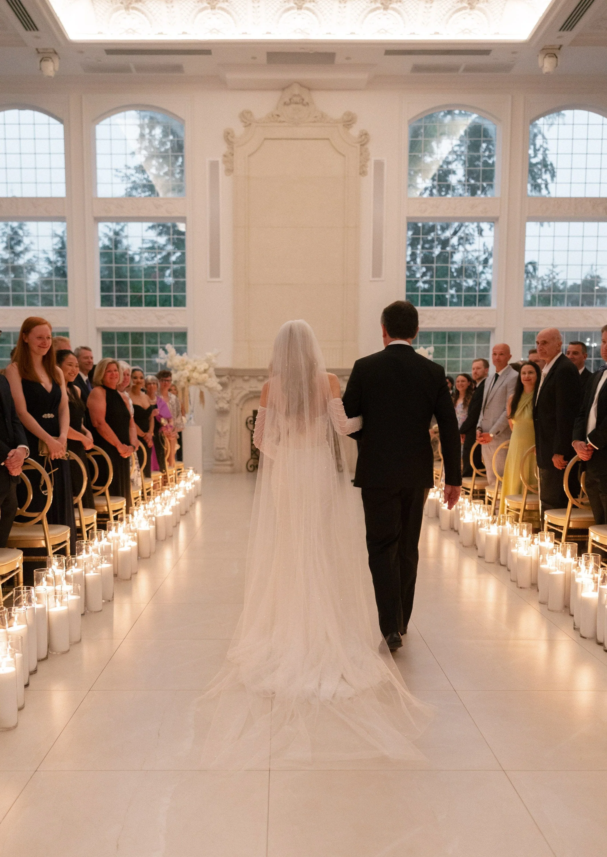 Caroline and her father during the wedding processional at Florentine Gardens in River Vale, NJ