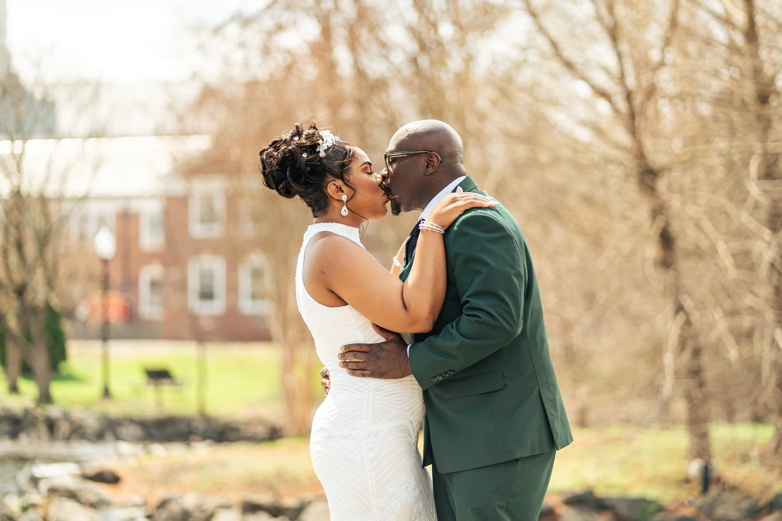 Couple kissing during their intimate elopement ceremony at Mindowaskin Park in Westfield, New Jersey.