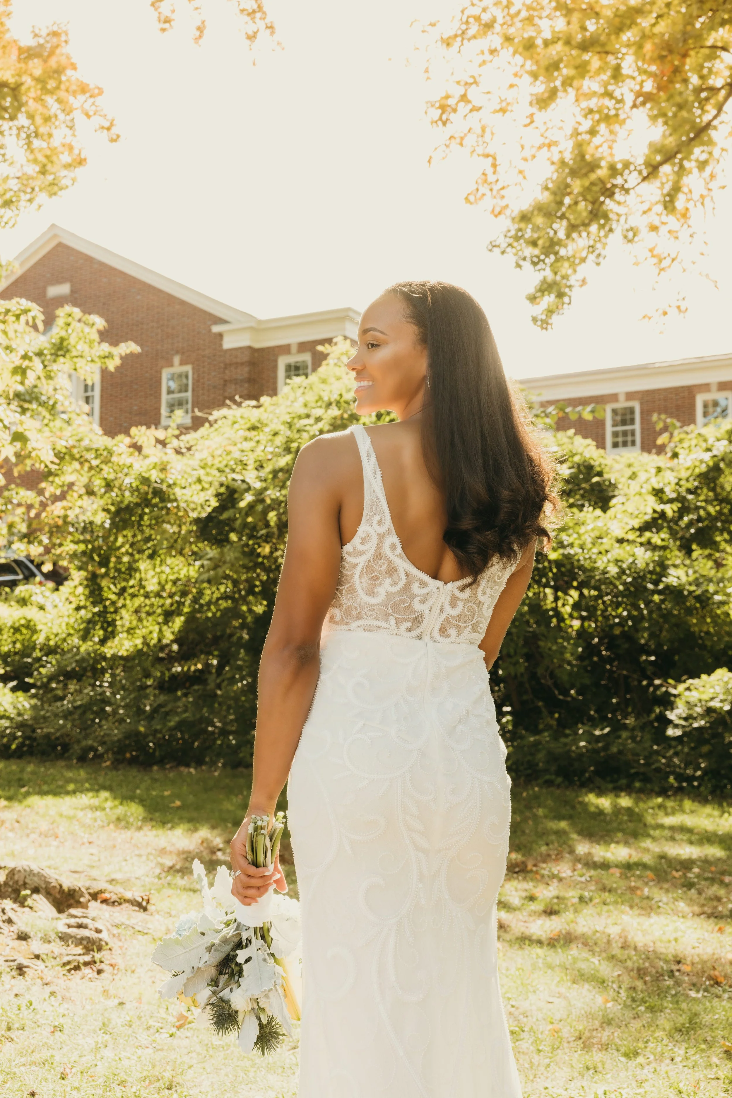 Jaide holding her bouquet during bridal portraits after her elopement at Mindowaskin Park in Westfield, NJ.