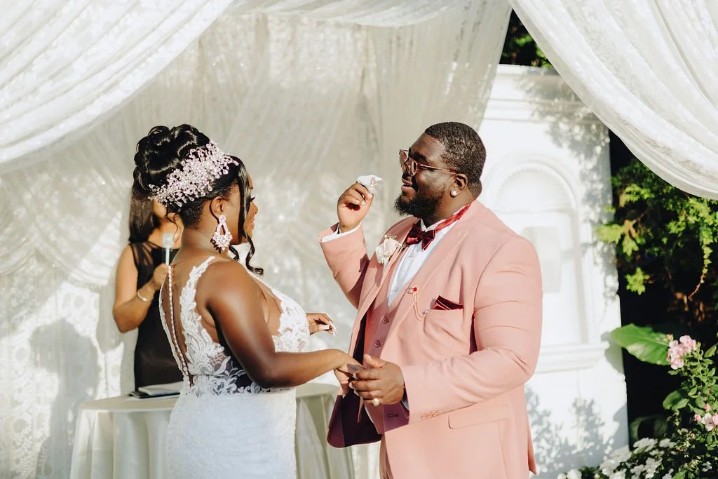 gillon-wiping-tears-kristie-sand-castle-wedding.jpg