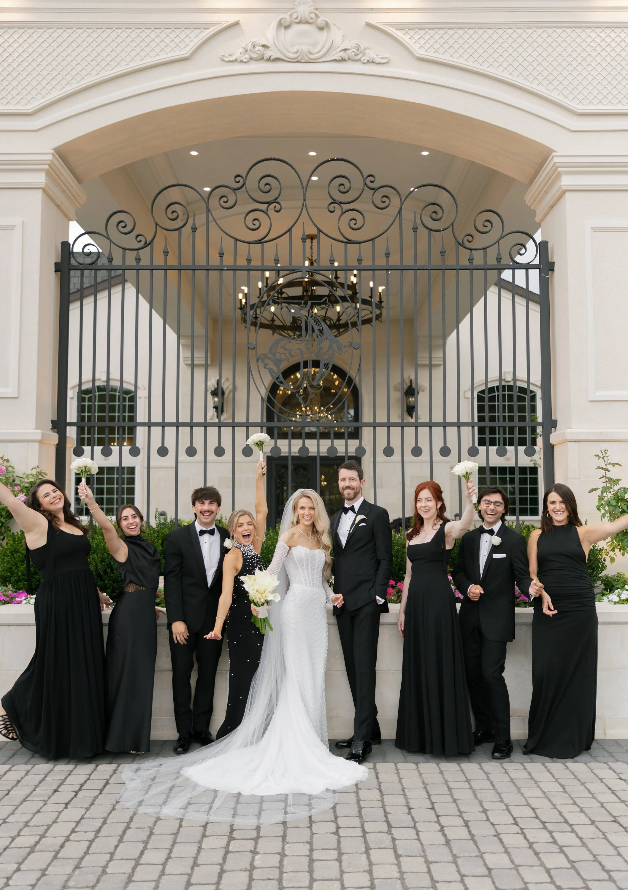 Caroline and Brett with their families outside Florentine Gardens on their wedding day in River Vale, NJ