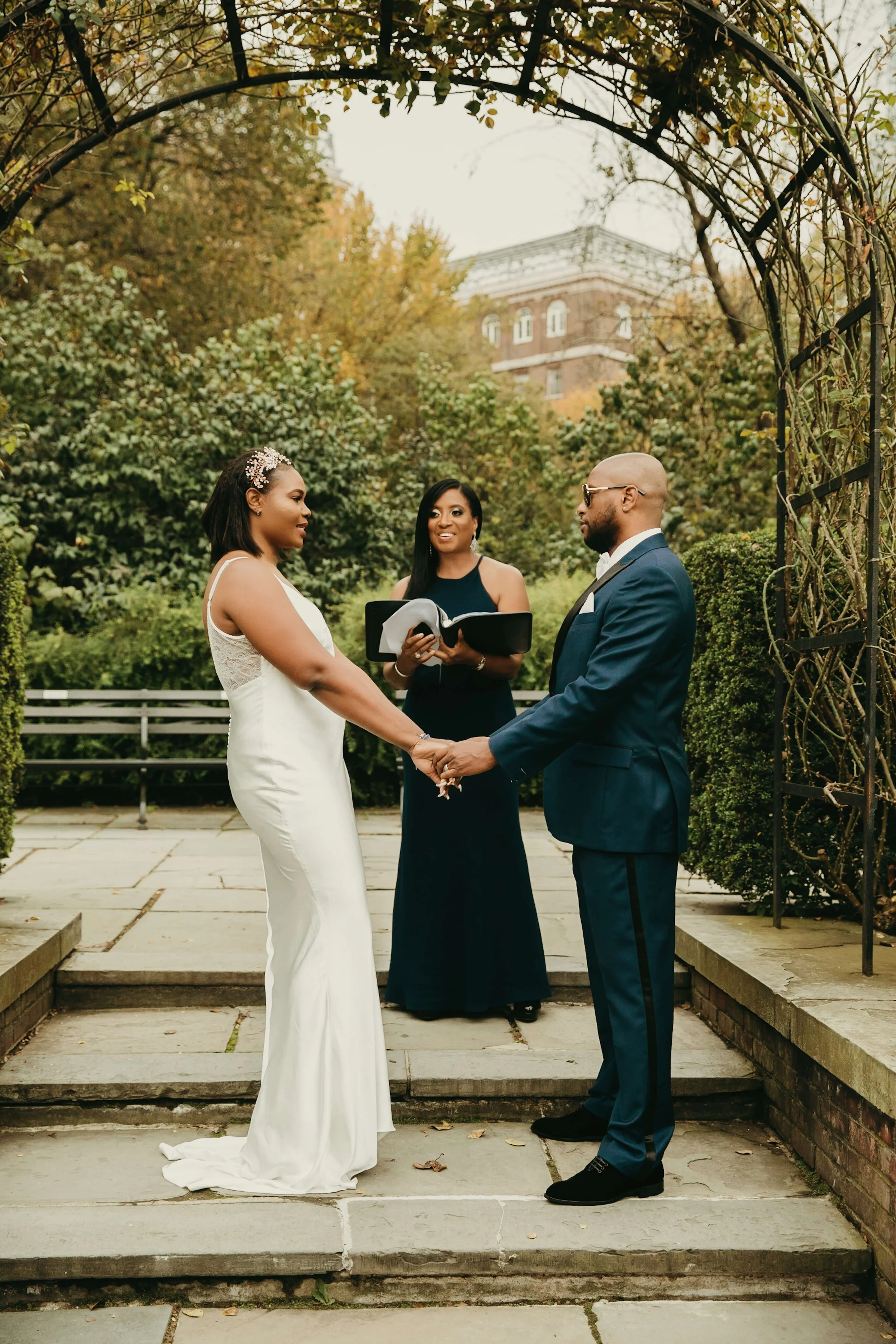 Couple exchanging vows during an intimate New Jersey elopement ceremony with officiant