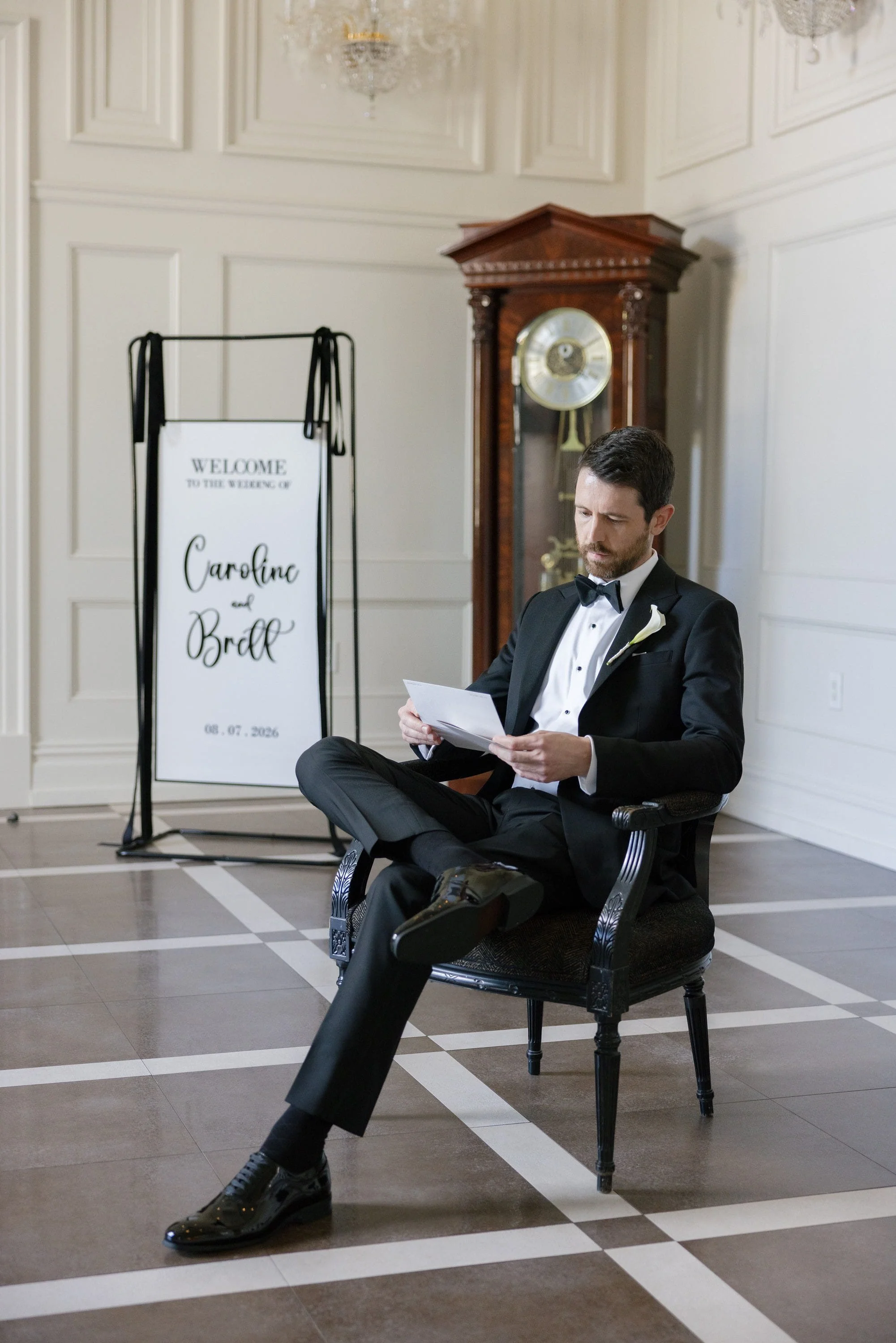 Brett reading a love letter from Caroline before their wedding ceremony at Florentine Gardens