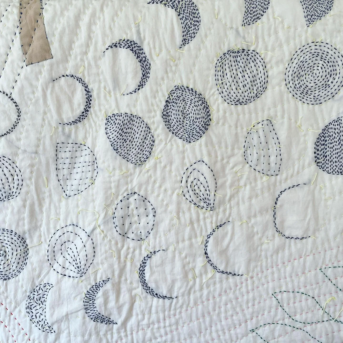 Reconstructed Quilt Detail moons.jpeg