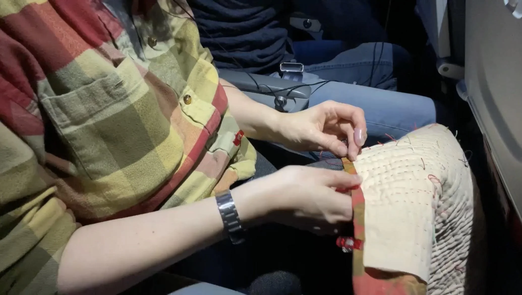 Heidi quilting Spectacle no. 10 on plane.jpeg