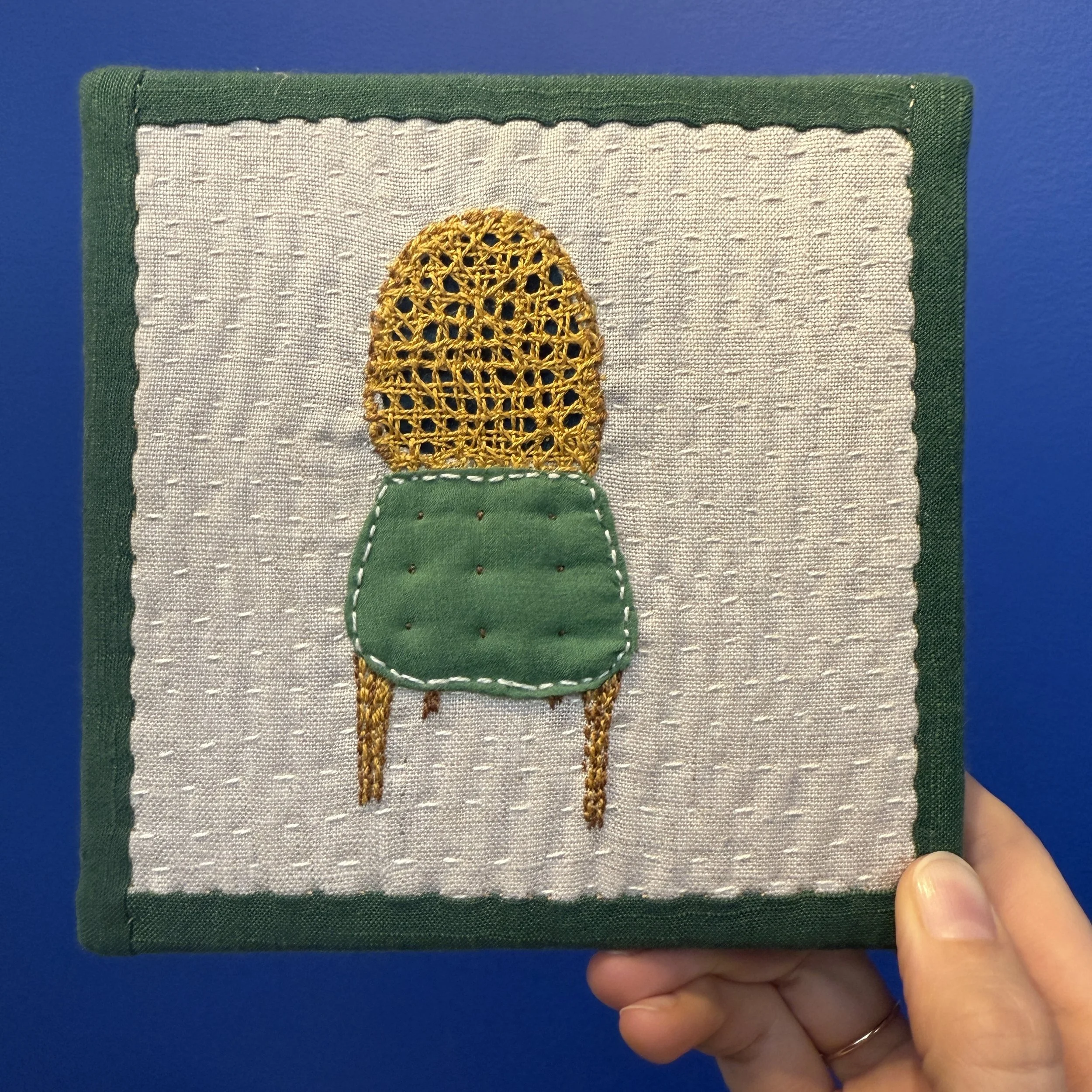Green cane back chair.JPG