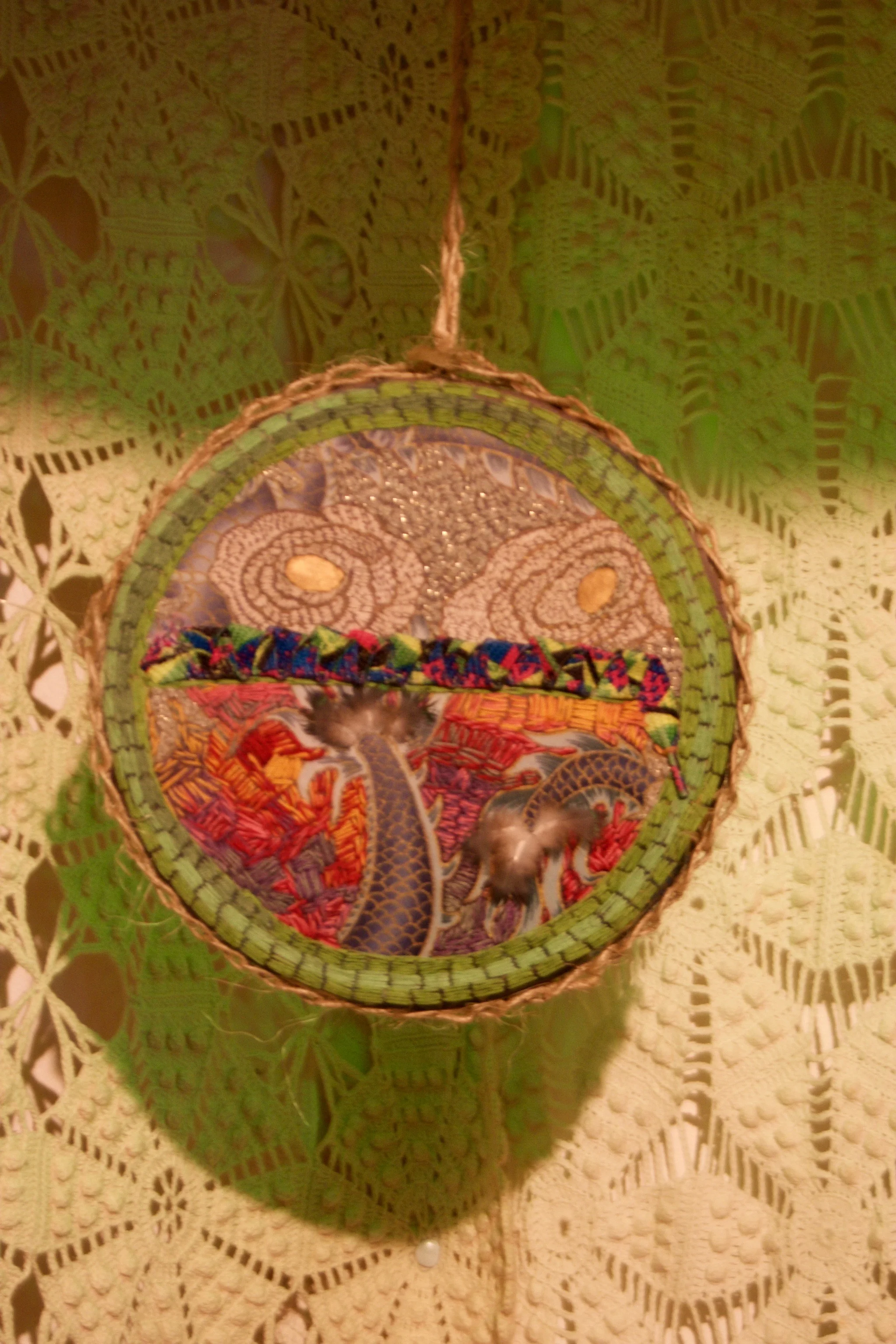 Equivalents , embroidery with feathers, shoelaces, and twine, 8 1/2 x 8 1/2 inches