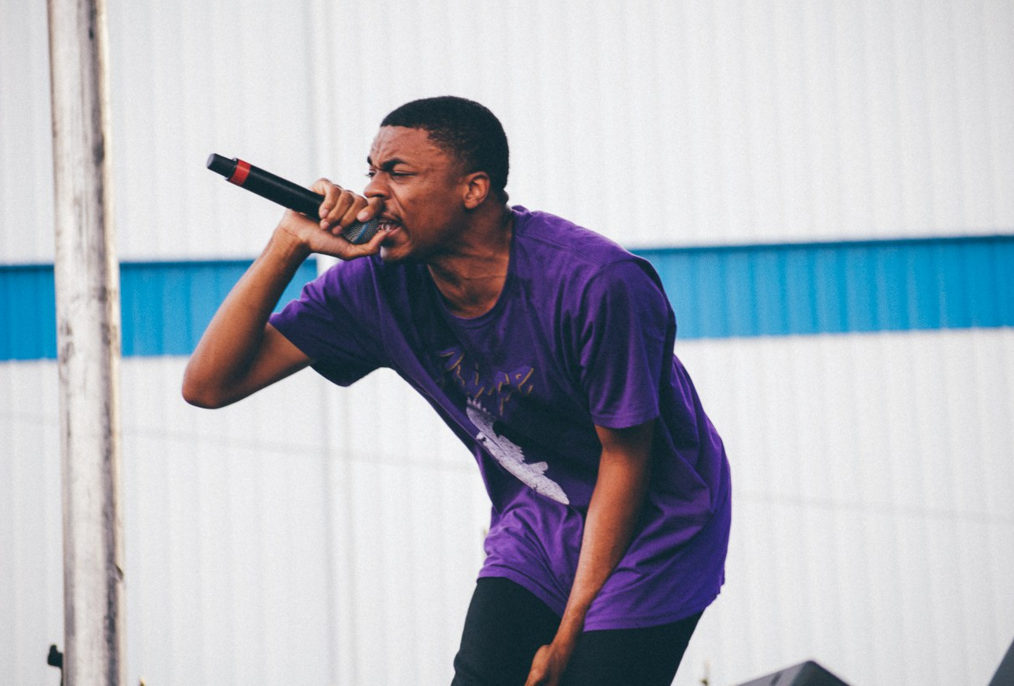 Vince Staples is a 22 year old rapper from Long Beach, California. Vince grew up in an environment surrounded by gangs, but ventured away from the lifestyle as he began making music. Early on, he became closely associated with the then budding hip-hop collective Odd Future, recording much of his early work with Odd Future member and lead singer of The Internet, Syd The Kid. Prior to his debut album Staples released 5 projects, including a mixtape produced fully by Mac Miller, and notably appeared 3 times on close friend Earl Sweatshirt’s debut album “Doris.” After signing to Def Jam, Vince finally released his debut album “Summertime 06,” to great critical acclaim. The 20-track double album was executive produced by famed producer No ID, and contains features from Future, Jhene Aiko, Joey Fatts and more. Vince’s immaculate production, hard-hitting rhymes, and energetic flows are not something to miss out on seeing live. Suggested Tracks: "Norf Norf", "Señorita", "Nate" 