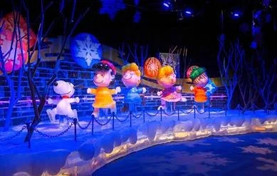 Hand-carved ice sculptures from ICE! at Gaylord Opryland Resort featuring A Charlie Brown Christmas theme.