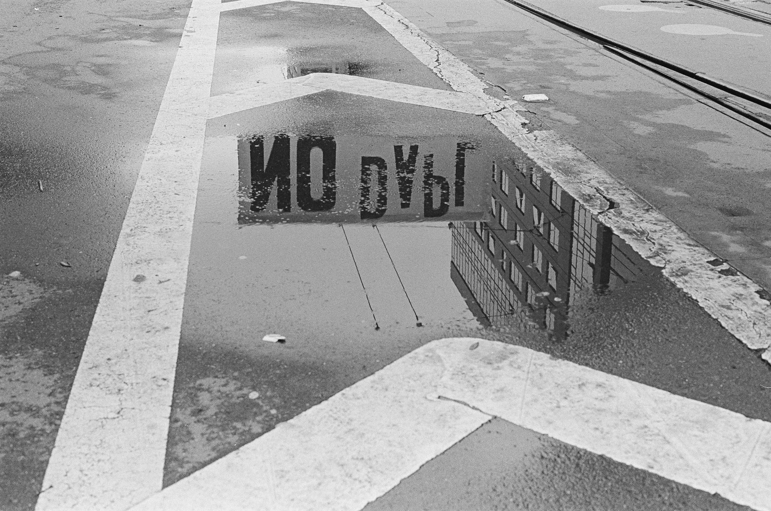 Reflection "NO DAPL" during the protest against the Dakota access pipeline, SOMA, San Francisco, California, 2016