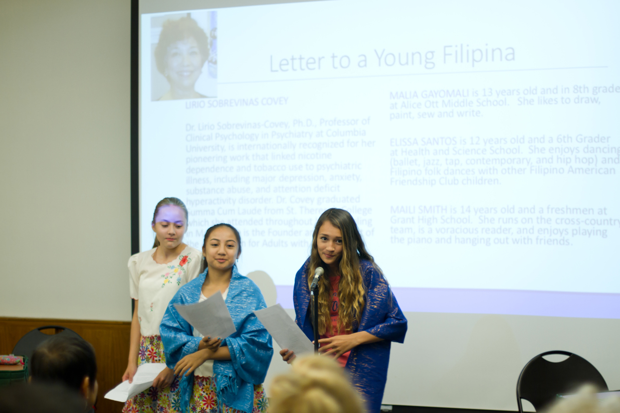 Malia Gayomali, Elissa Santos, and Maili Smith read Letter to a Young Filipina by Lirio Sobrevinas Covey.