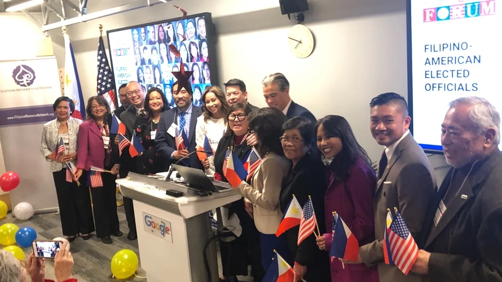 Marily Mondejar (at podium with glasses) is flanked by Filipino Americans recently elected during the mid-term 2018 U.S. elections. At the Fil-Am Victory Celebration on January 31, 2019 in San Francisco hosted by Filipino American Community Forum. (Photo: Filipina Women’s Network)