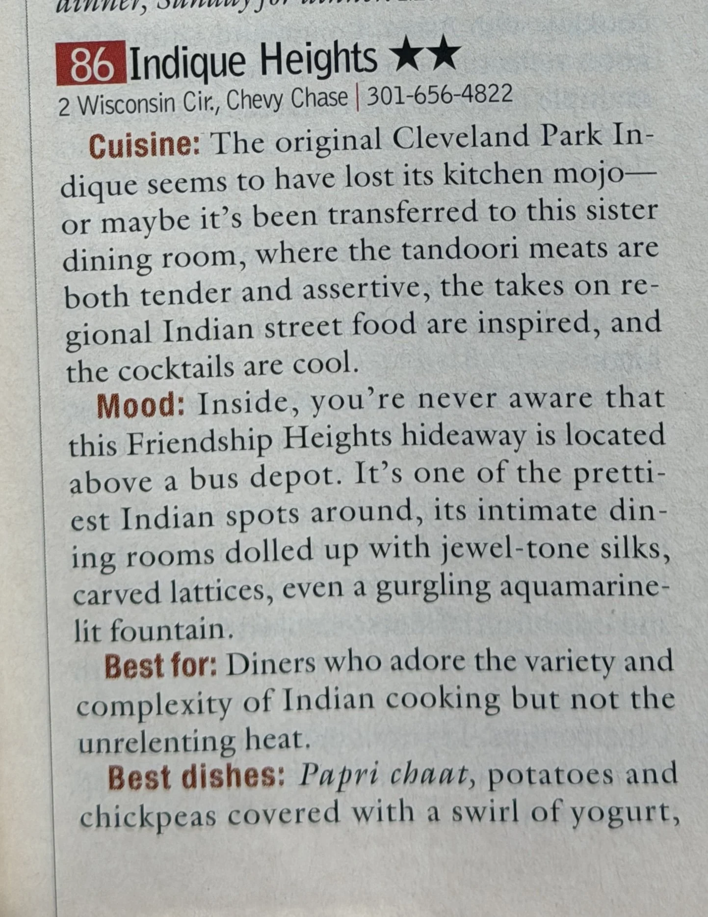 A page from a magazine or book describing Indique Heights restaurant, located at 2 Wisconsin Circle, Chevy Chase. It includes a review of the cuisine, highlighting Indian street food, and mentions the ambiance, interior decor, and recommended dishes.