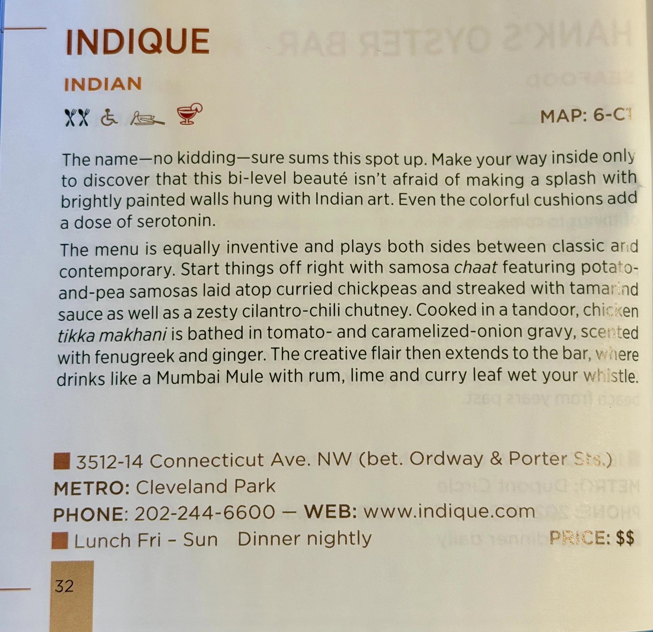 Menu description for Indian cuisine with symbols indicating vegetarian, wheelchair accessible, and parking, along with address, metro, phone, website, and hours of operation.