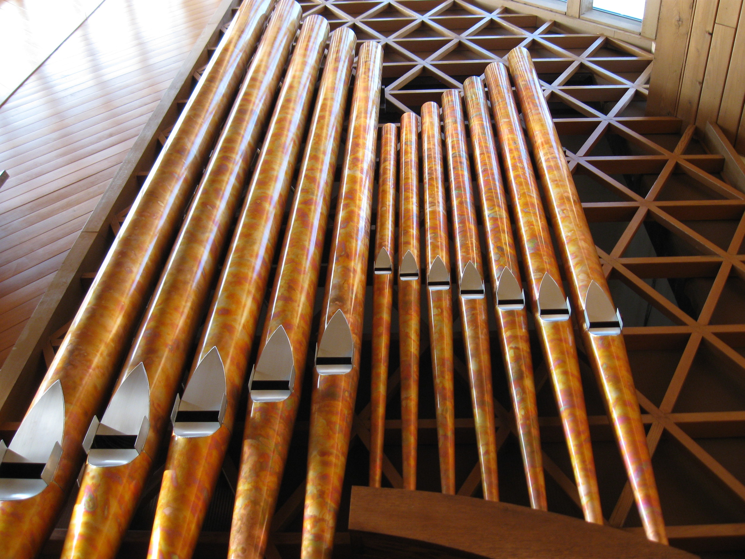 Detail of the facade's flamed copper 16' Pedal Principal 