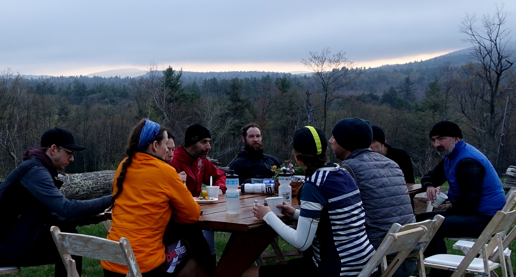 Strategy Before Sunrise : Some of the Manehars discuss the day's plan during the 5:00 am breakfast.