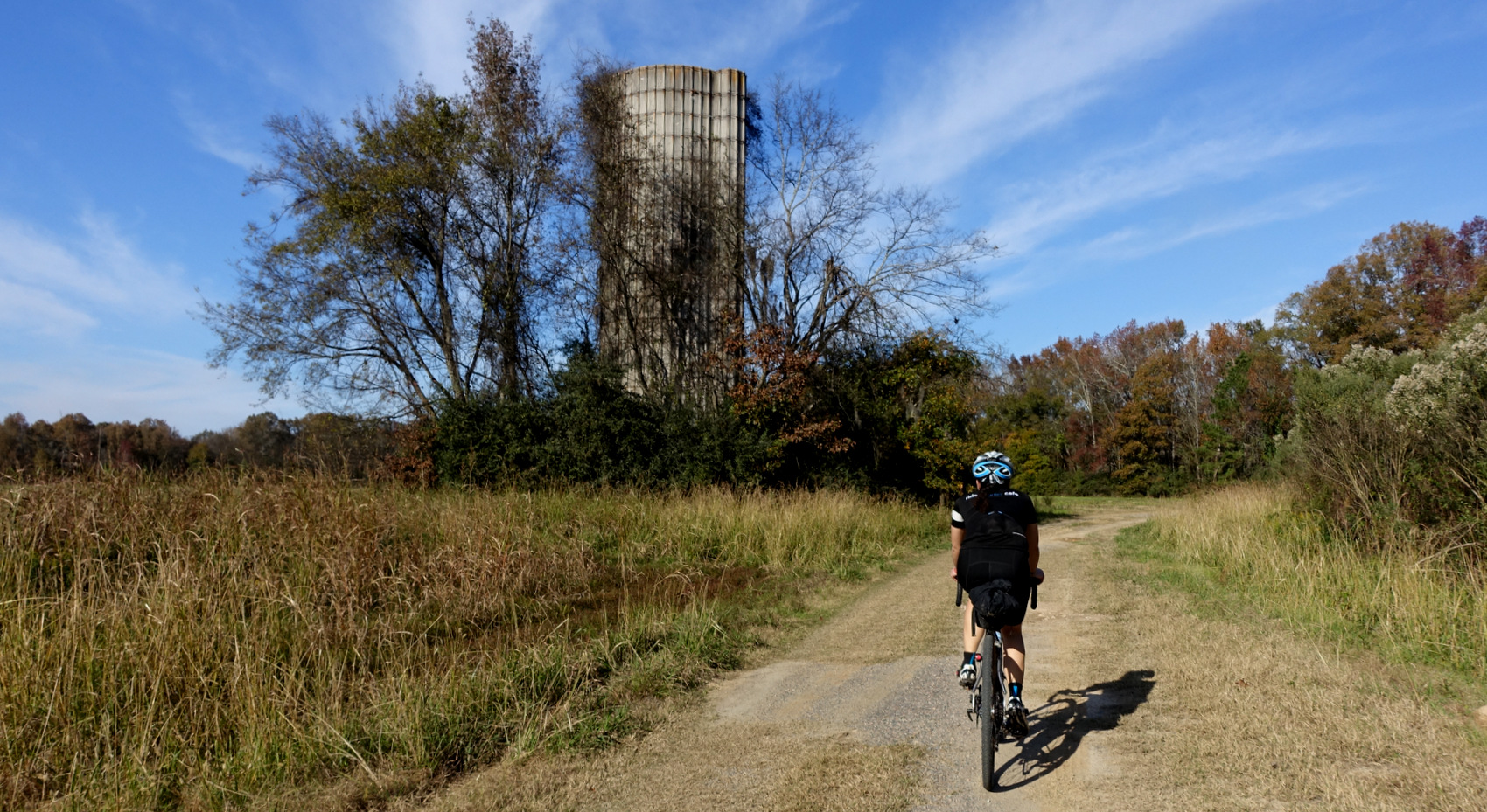 Here's one of the transition points between stunning singletrack to more dirt road. An abandoned silo stands watch over our group.