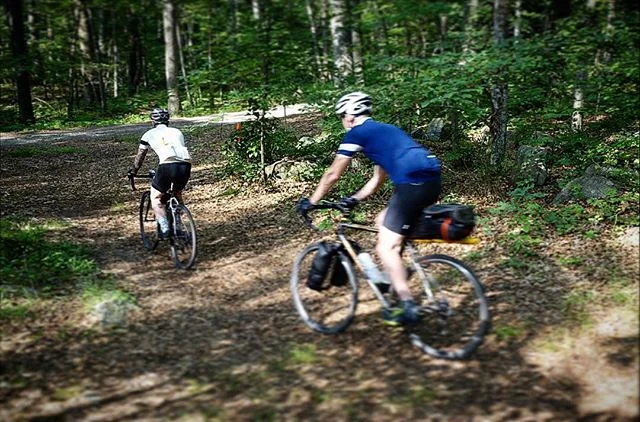 Nomad riders transitioning from primitive singletrack to dirt road to quiet pavement. Just another day on the Nomad Three Day. Much fun!  #nomad3dayobc #bikepacking