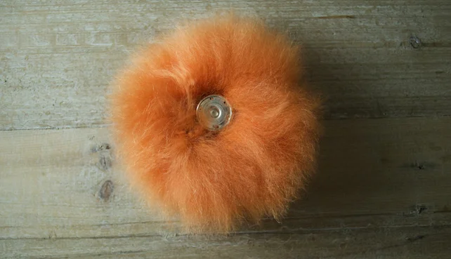 Orange Pom Snap.jpeg