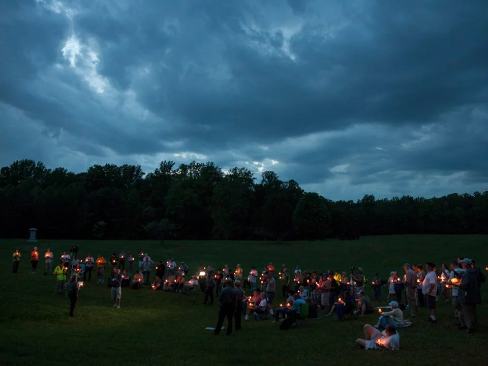 Visitors solemnly remember the devastation at the Bloody Angle during the sesquicentennial of the Battle of Spotsylvania Court House