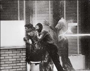  Protesters hit with fire hoses, May 3, 1963. Photo by Charles Moore. 