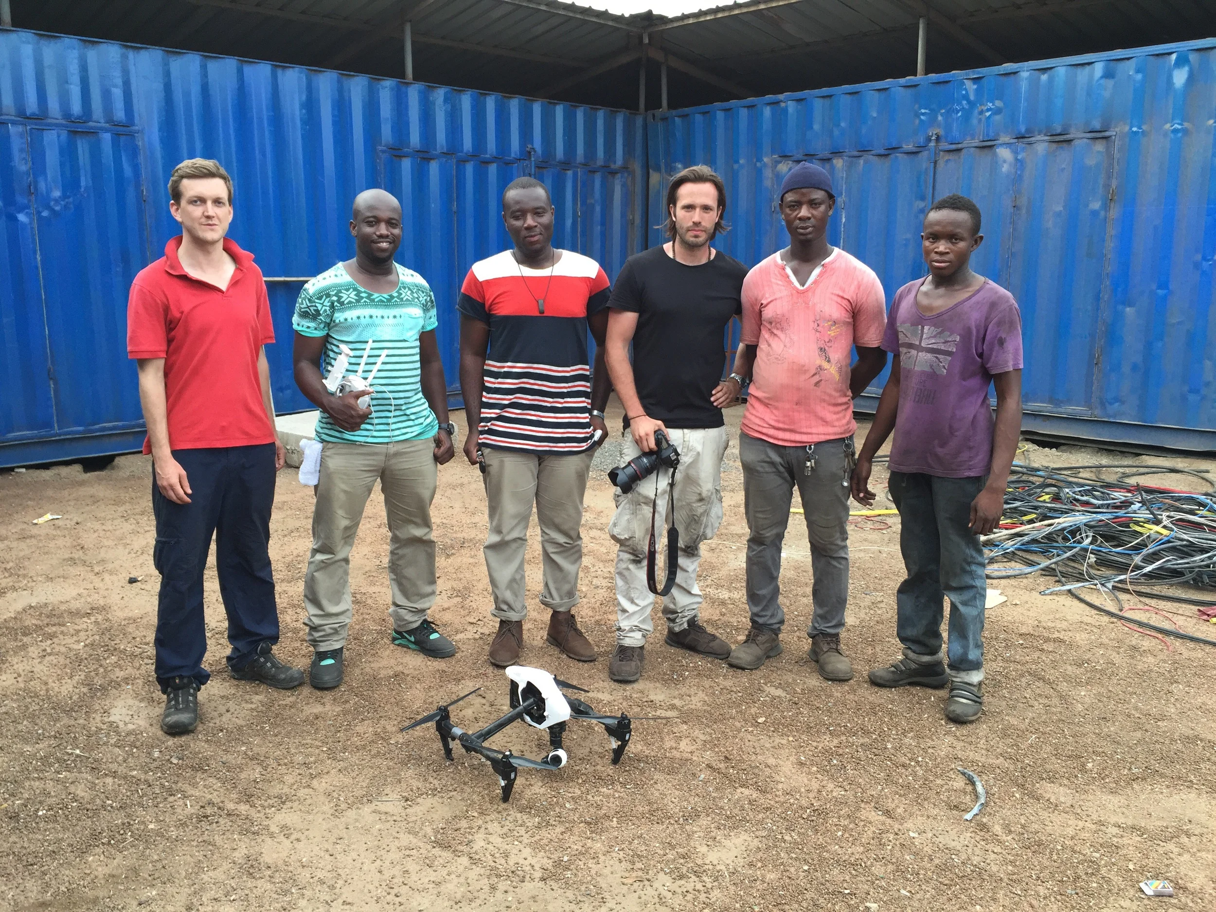 Drone filming at Agbogbloshie with (from left) Huw P-W, Hasel from Aeroshutter, our Ghana Production Manager Justice Anthony, Alexis Wilski, our Agbogbloshie guide Karim, and our actor for the day Abdullah (Carlos). 