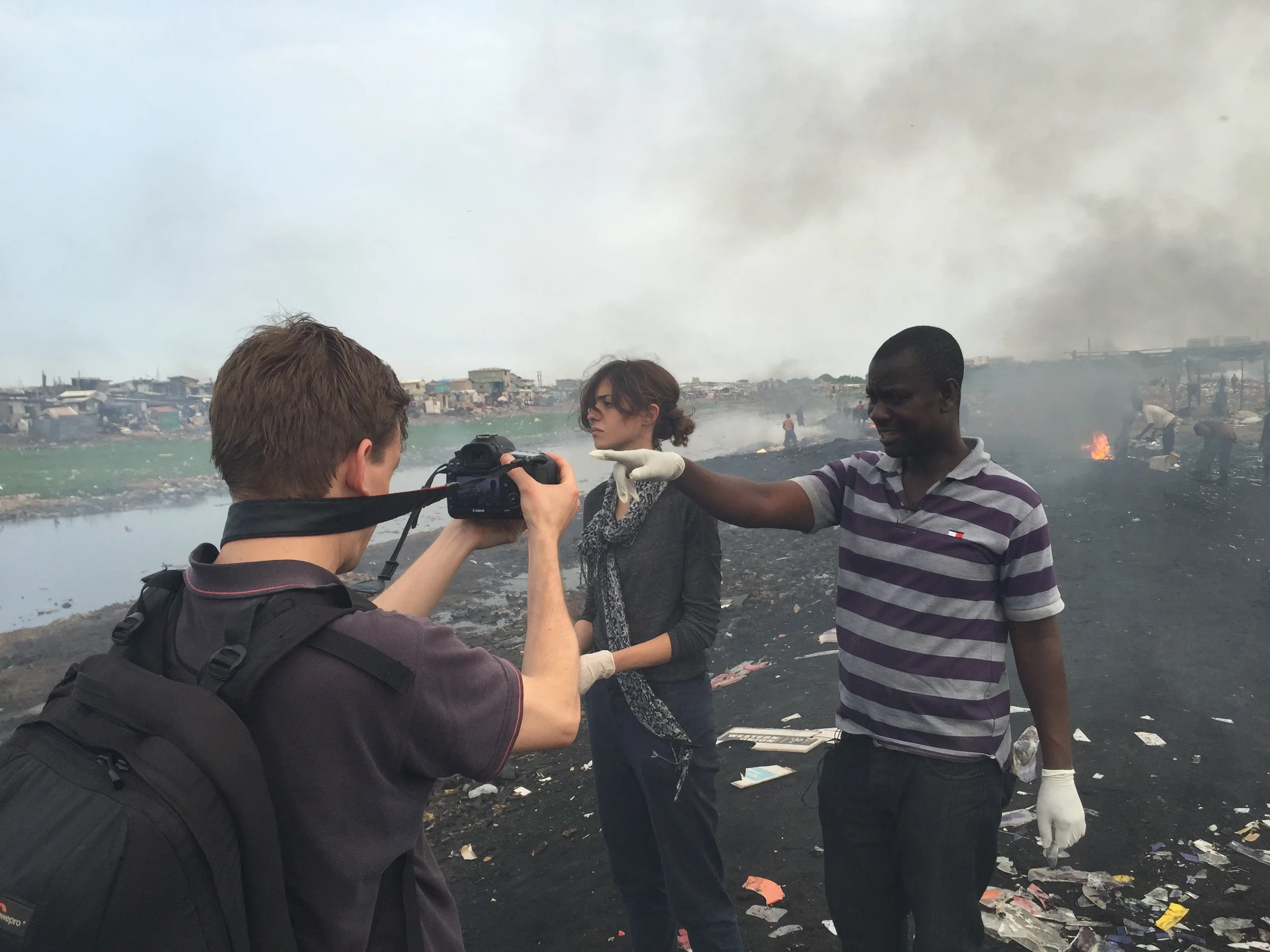 At the burning site at Agbogbloshie with (from left) Huw P-W, Markella Koniordou, and Sampson Atiemo.