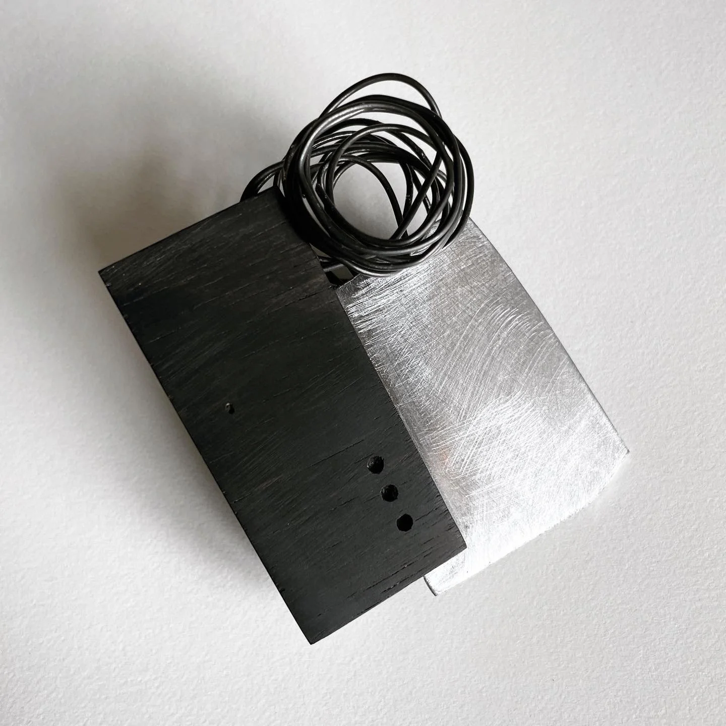 broach: steel, ebony