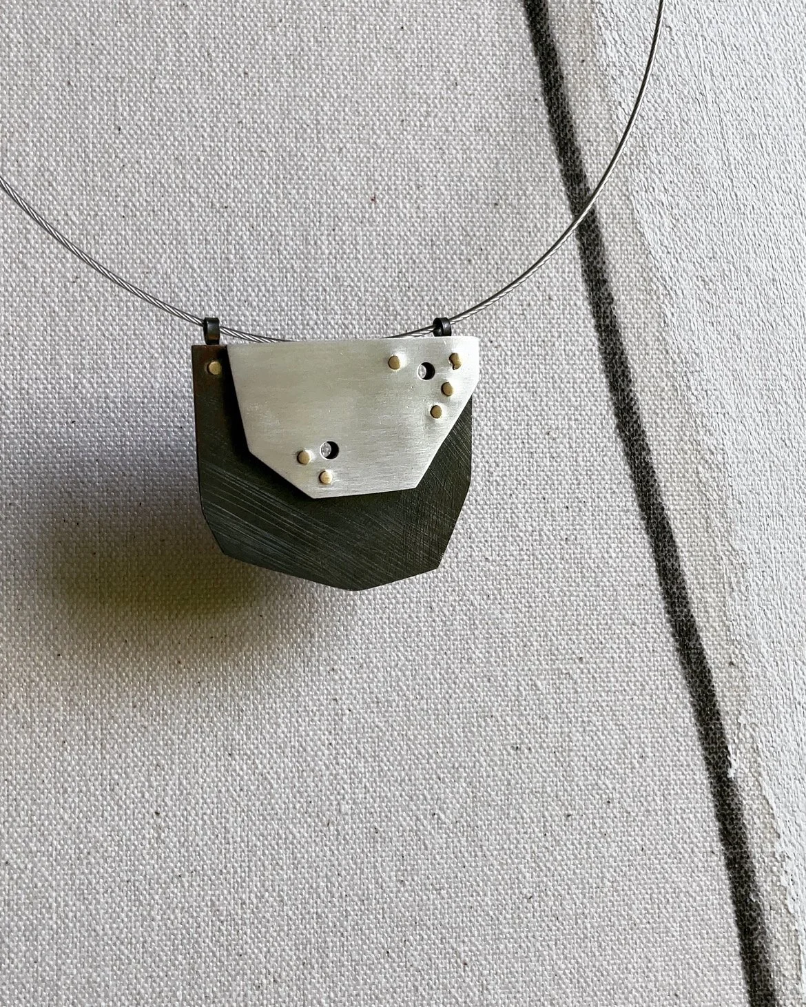 necklace: sterling silver, brass