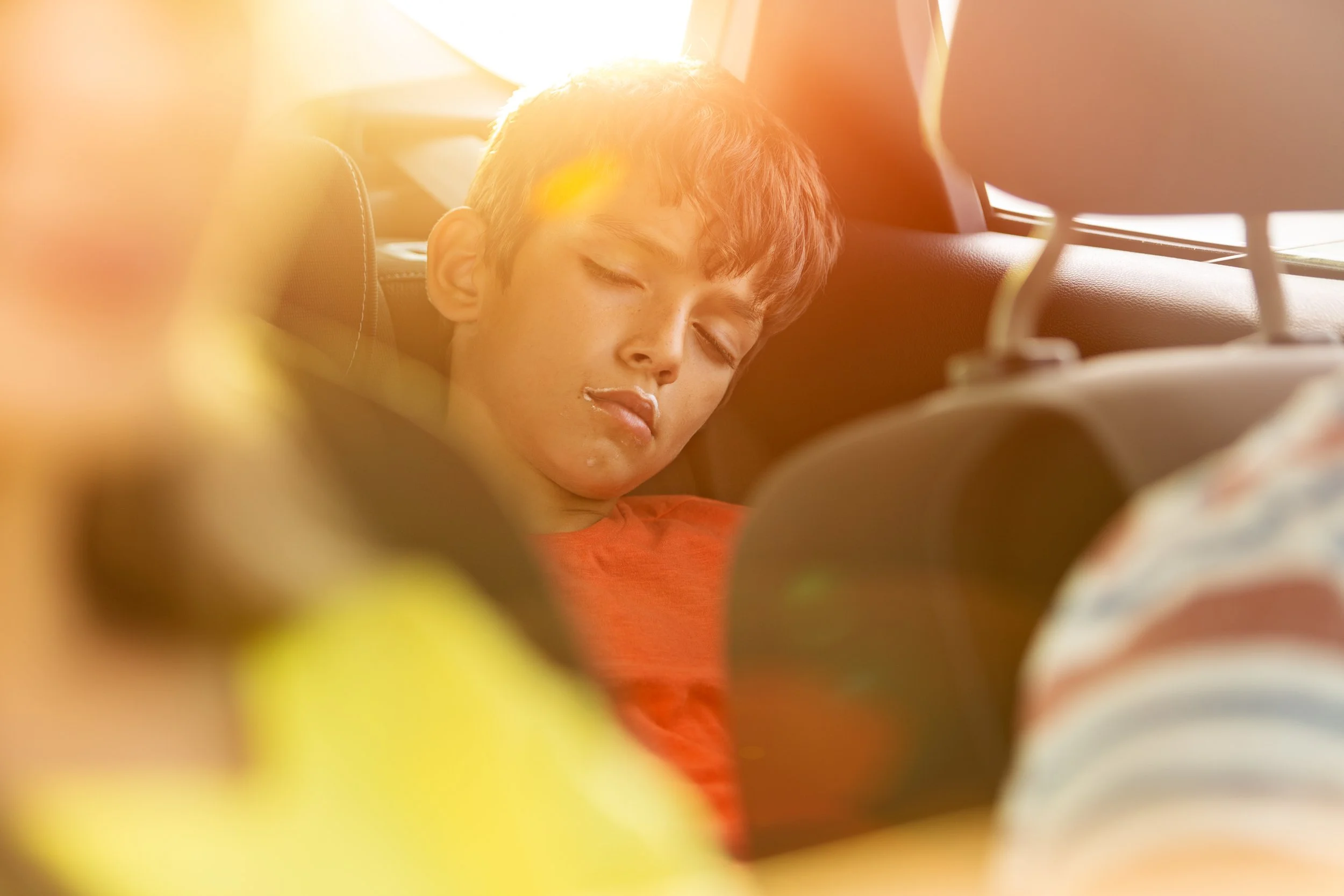 JV_family_sleeping_in_car.jpg