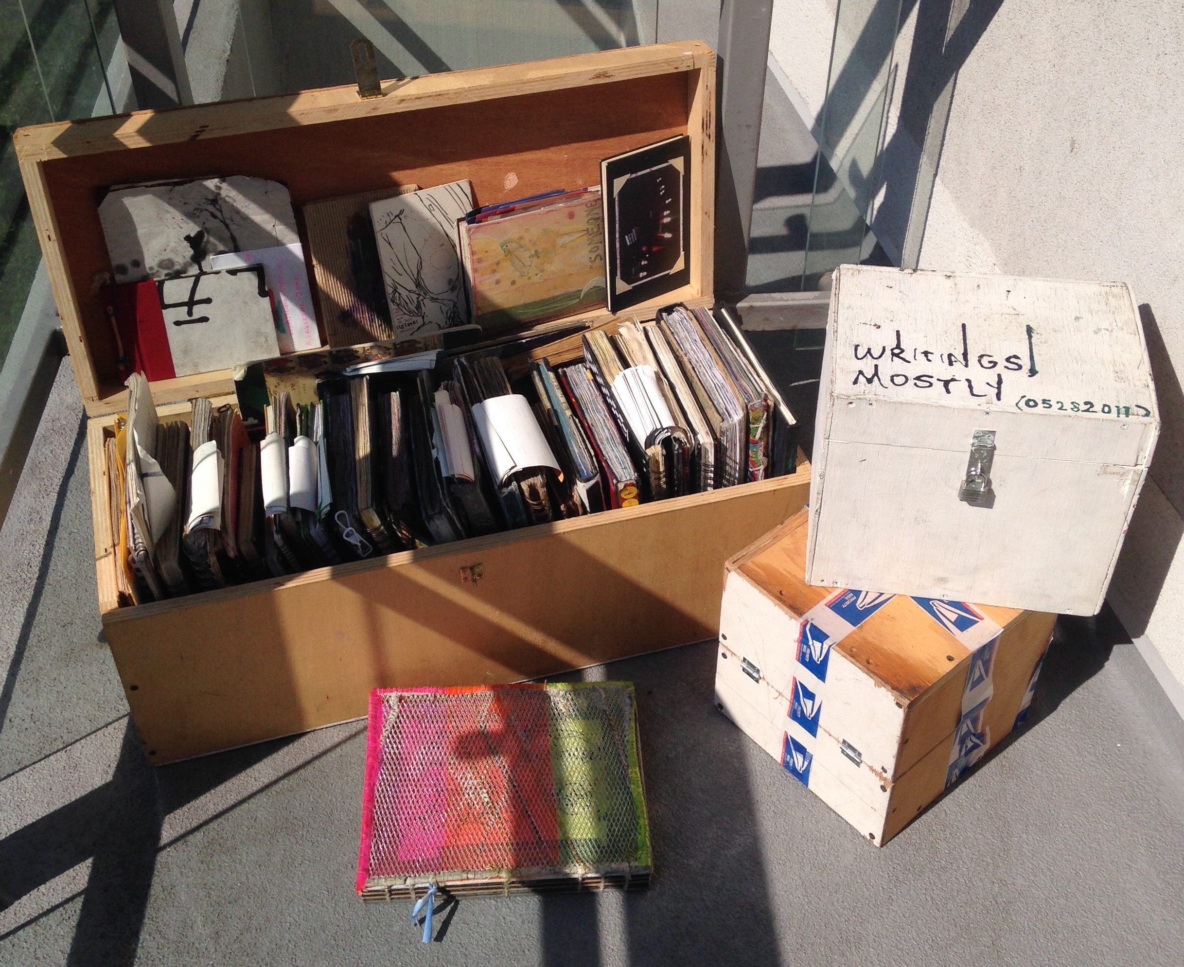 Sketchbooks and Journals in handmade boxes, on a balcony in NYC (2016)