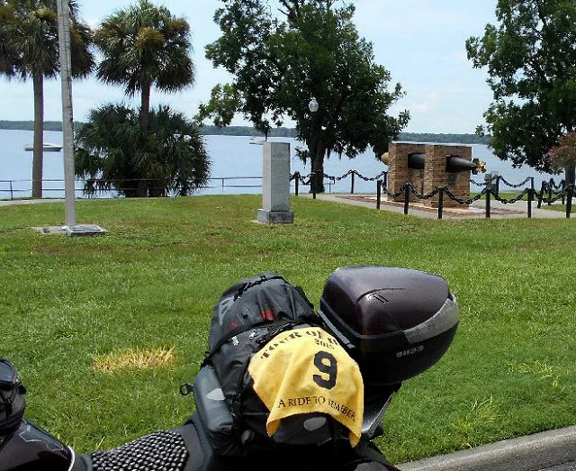 FL3 - USS Tang Memorial Palatka, Florida 100 Memorial Parkway GPS: 29.64535, -81.62933 Access: 24/7, unrestricted. Nearby parking is available along lightly travelled Memorial Parkway. For ADA access, park along St Johns Ave to the north, then via sidewalk and paved path to the memorial, although it could be a distance. Take a photo similar to the one above, along with rider flag and motorcycle. Refer to RULES 5-7 ( http://www.tourofhonor.com/pages/rules.html#rules57 ) for photo verification. Scorers have final say whether standards are met. More.... The USS Tang Balao class submarine entered service in 1943 and sank in the Formosa Strait in 1944, a victim of her own malfunctioning torpedo. In that brief time, however, she sank 31 enemy vessels, earning two Presidential Unit Citations and four battle stars. Commander Richard H. O'Kane, washed off the bridge as the ship sank, lost all but eight members of his 89 man crew. Following his release from a Japanese POW camp, O'Kane received the Medal of Honor for "conspicuous gallantry and intrepidity" during his submarine's final operations against Japanese shipping. Made in America: There are four E. M. Vequesney Doughboy statues flanking the adjacent US 17 bridge over the St Johns River. Two of those are one-of-a-kind variants, and the Smithsonian lists Gutzon Borglum (Mt Rushmore) as co-artist of the ‘parade rest’ doughboy at the southeast corner of the bridge.