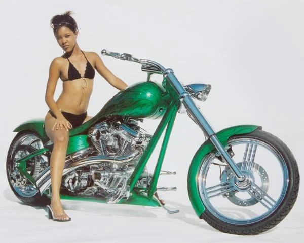 Lalisha Sitting on Green Bike.jpg