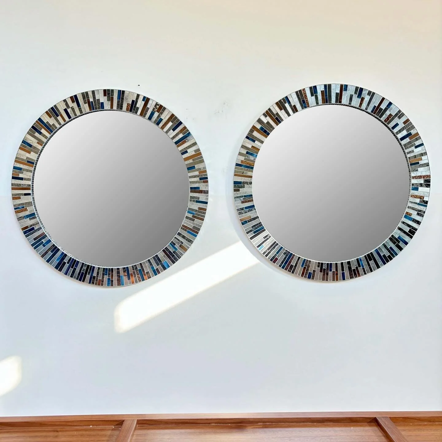 ✨ Piece of the Week ✨

A striking pair of custom mirrors with hand-cut glass mosaic in shades of Notte, Antique Silver, and Bronze Mirror. Custom crafted for @dunnamzerbini