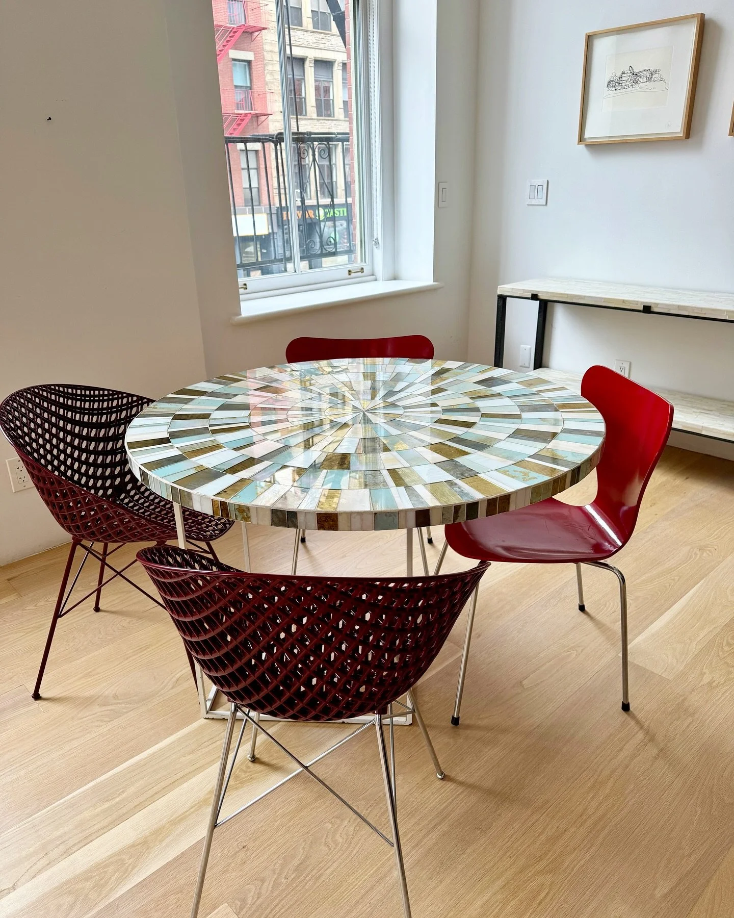 Gather in style around this stunning hand-cut glass mosaic dining table, featured in our founder Ornella&rsquo;s Tribeca loft, where design meets dining.