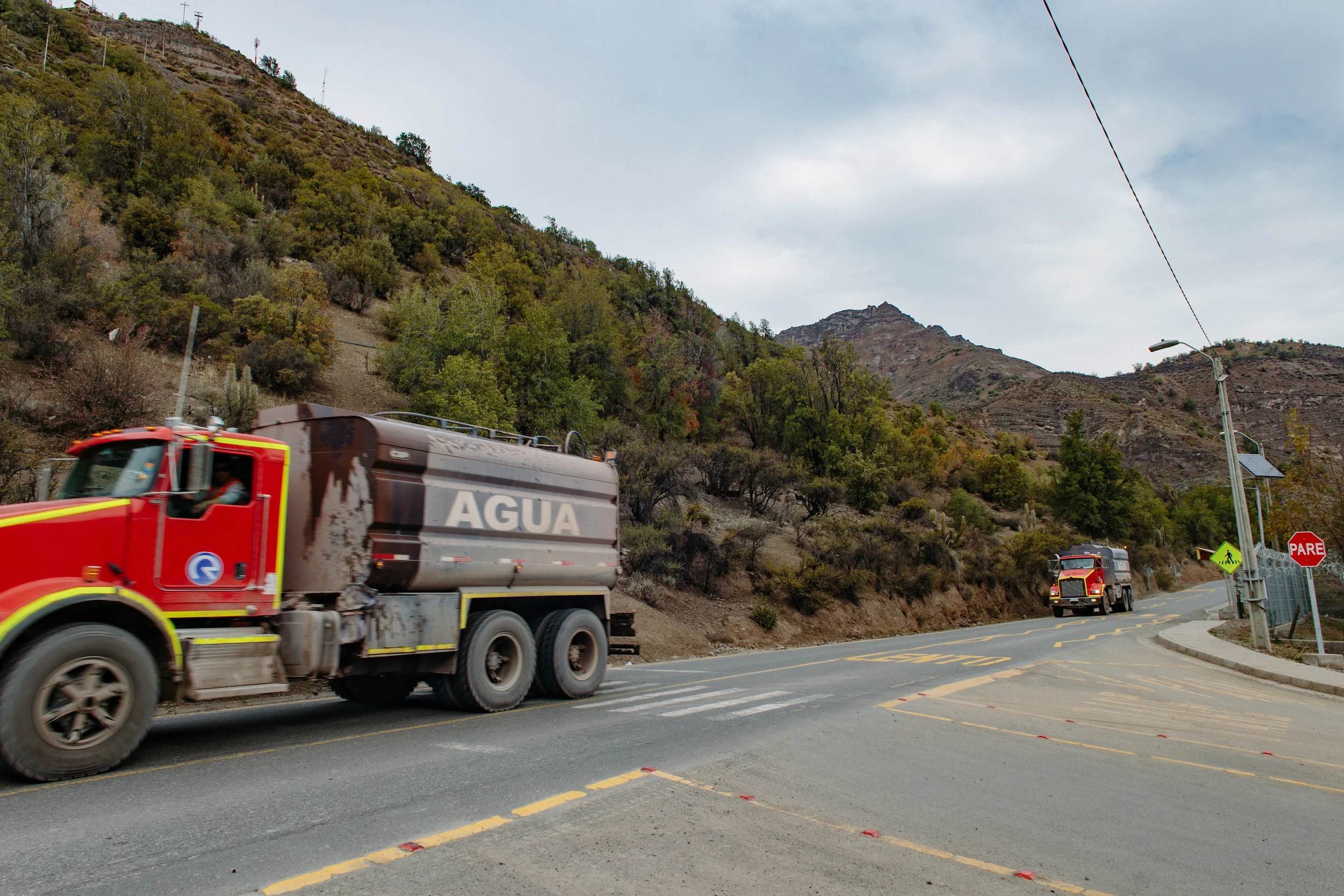 Trucks and machinery fill the roads of the Cajón as construction of the Alto Maipo project progresses.