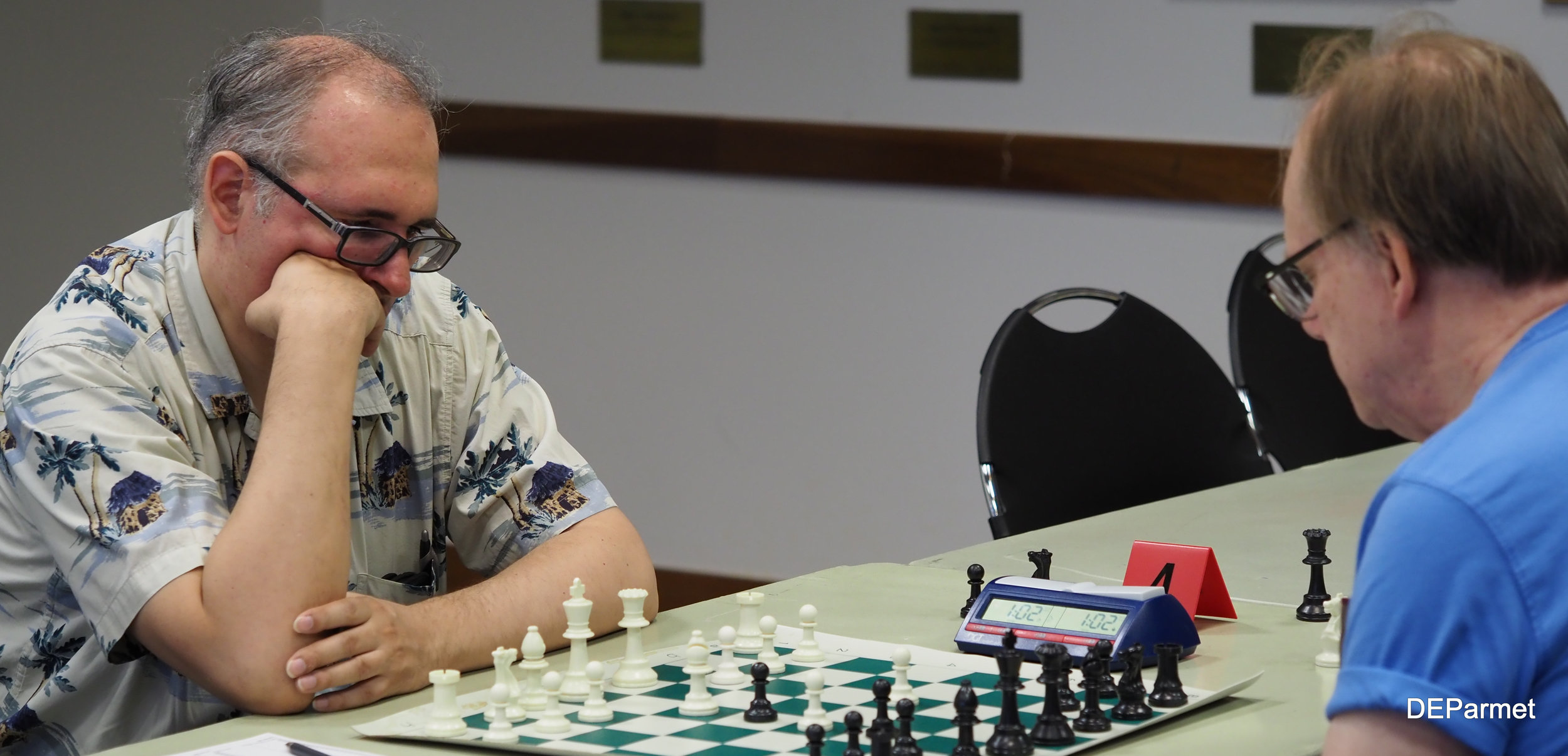 A classic Chicago matchup: NM Steve Szpisjak faces off against Steinitz's wildest disciple, Bill Smythe.