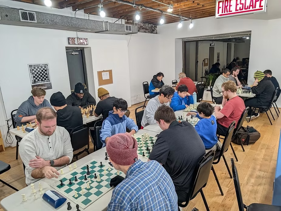 Beginner chess player competing in a Chicago chess tournament