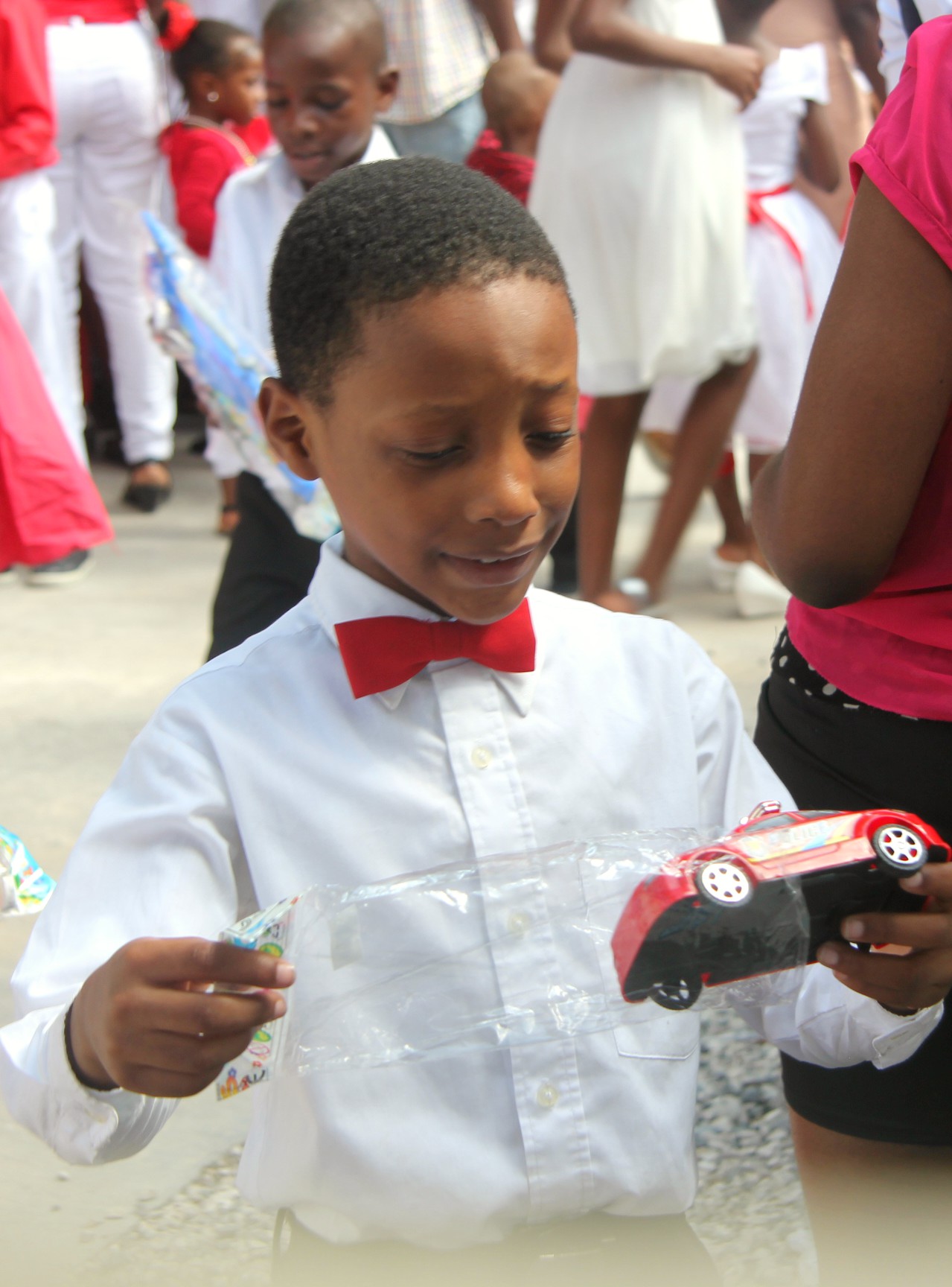 EDIT boy opening car gift.jpg