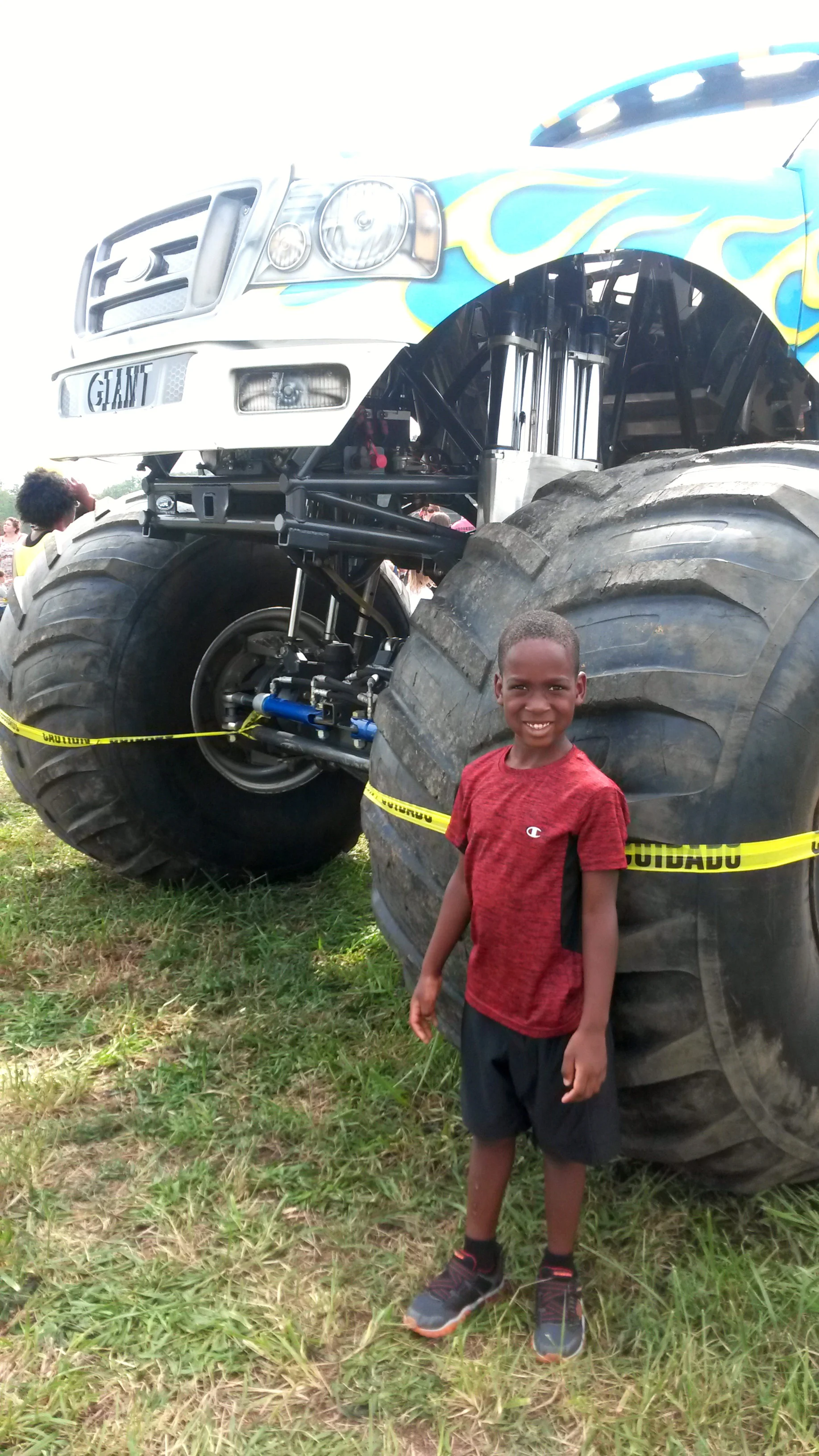 At a “Touch a Truck” event— Tre LOVES monster trucks!