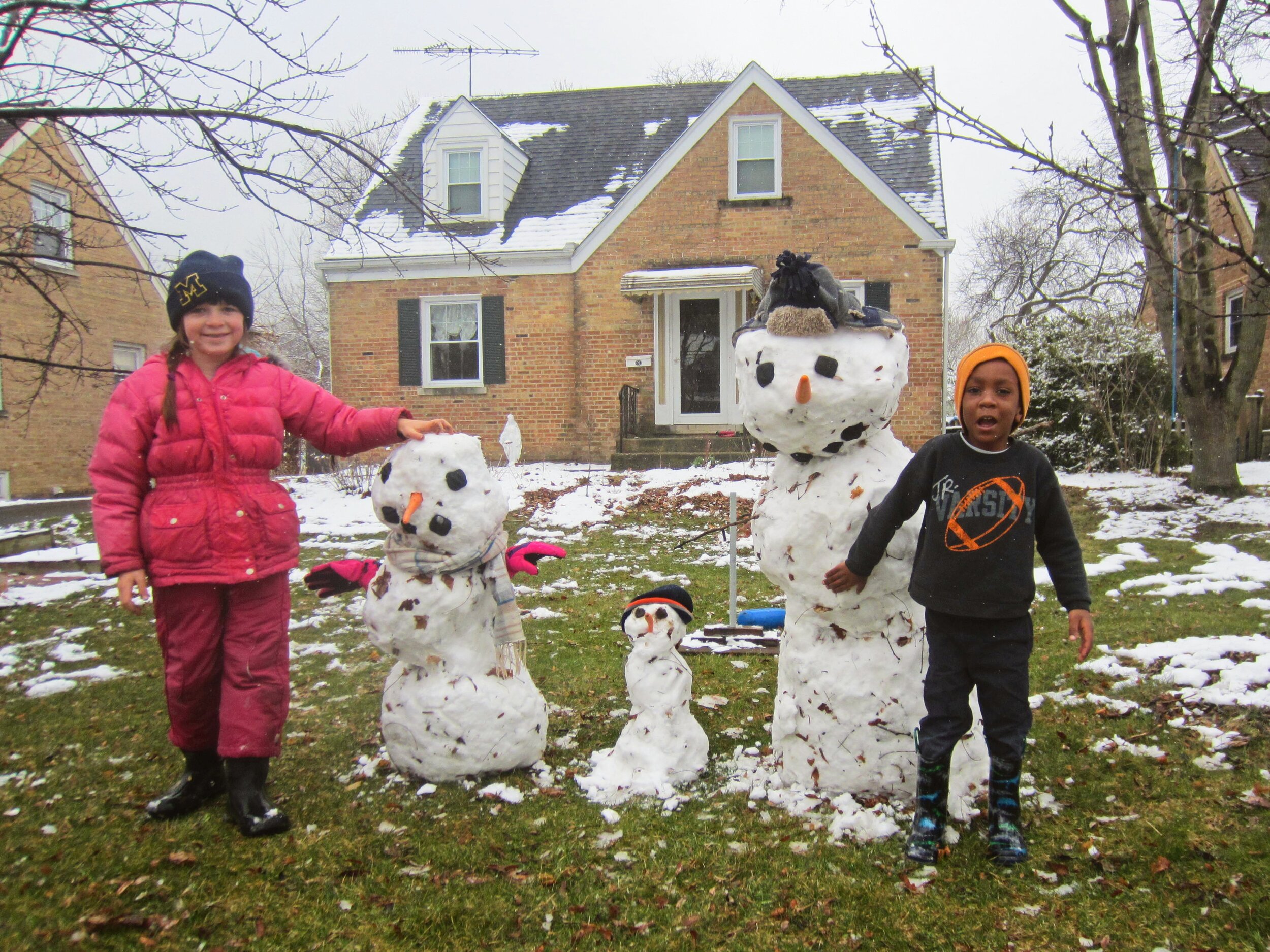 With sister & snowmen.jpg