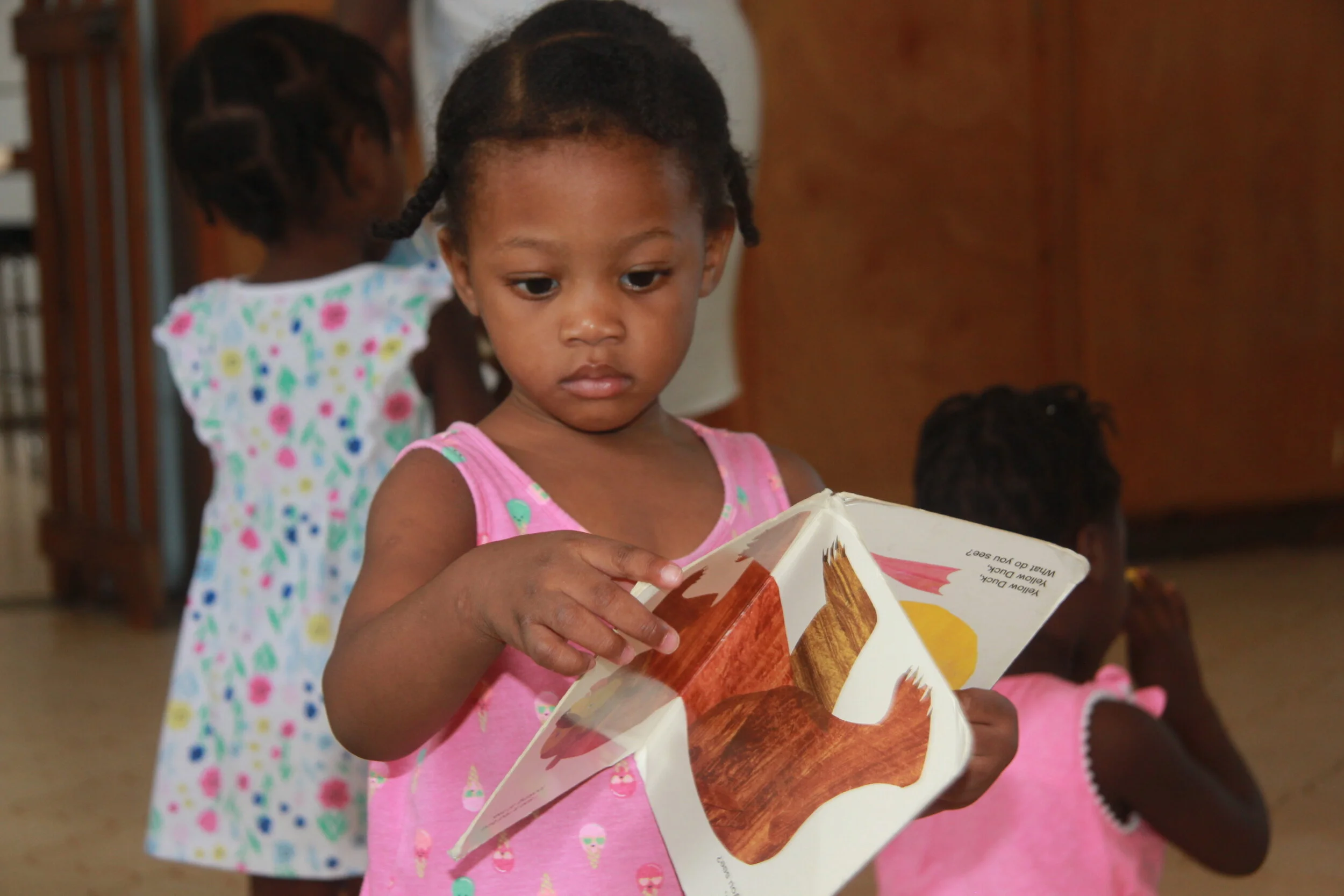  Schnaidine reading her book 