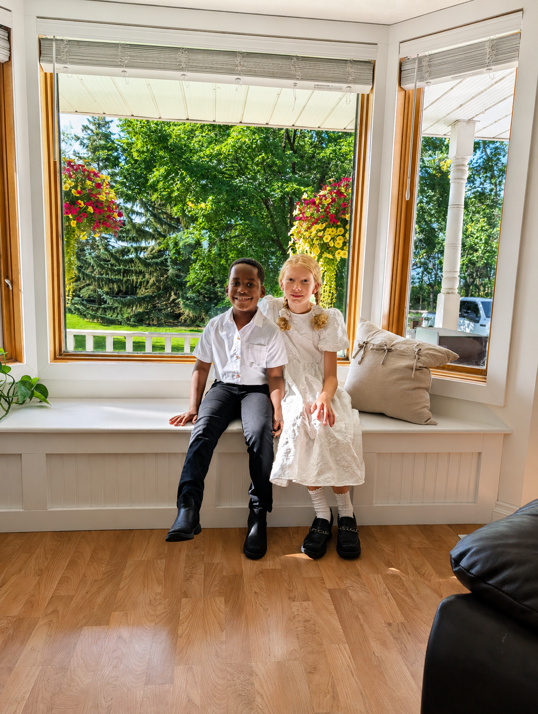 With sister by window.png