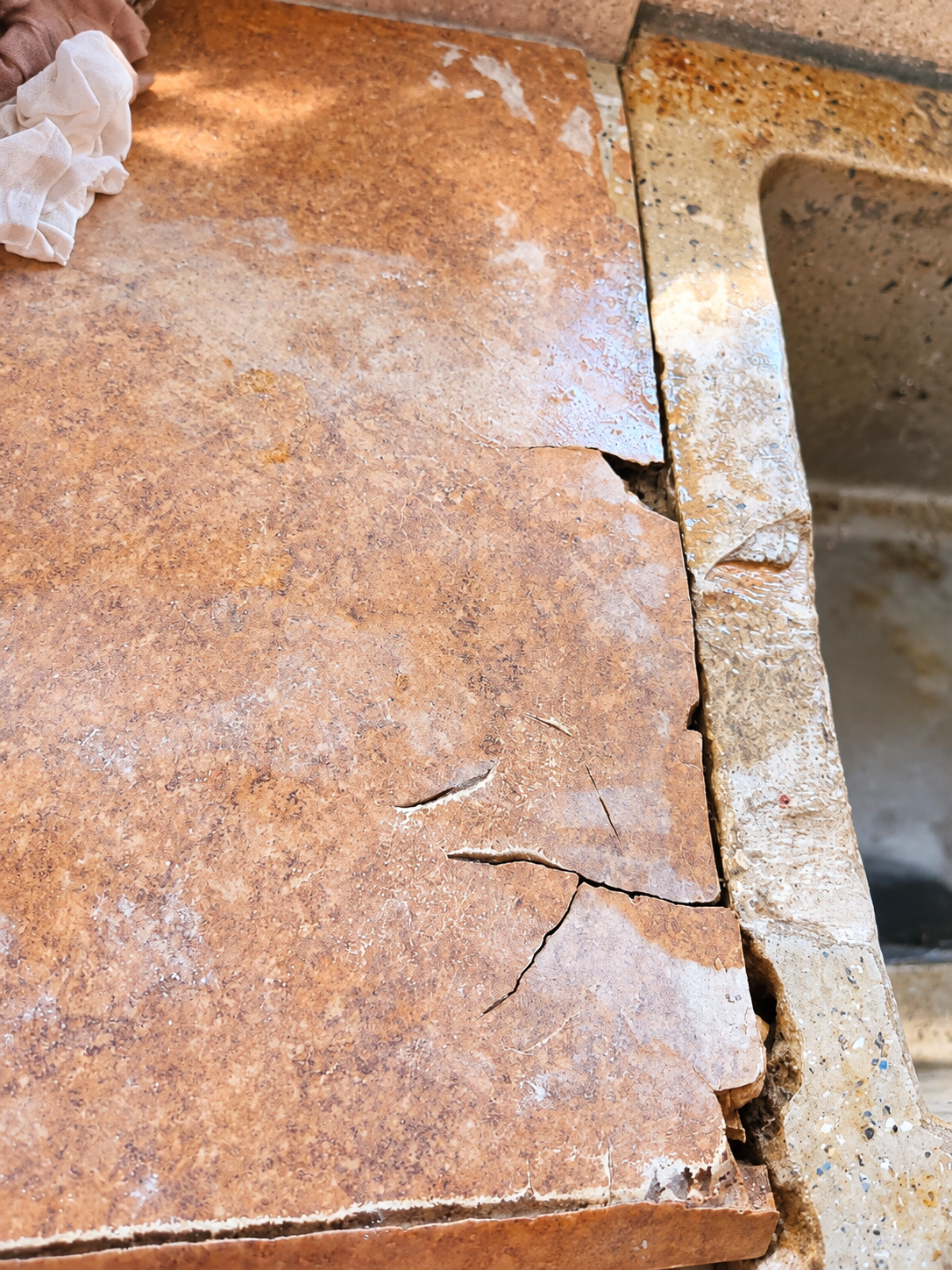 Cracked Worn Countertop and Sink.png